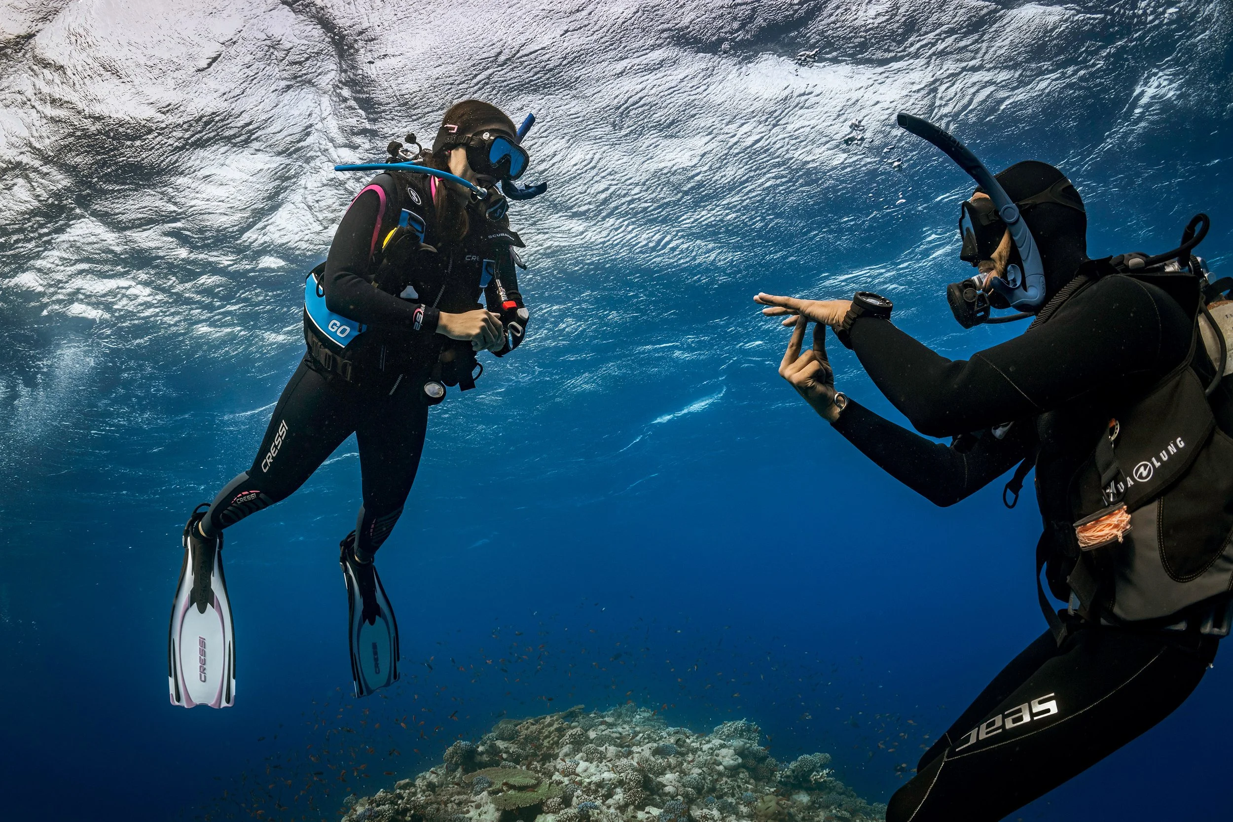 scuba instructor guiding divers in Amed Bali
