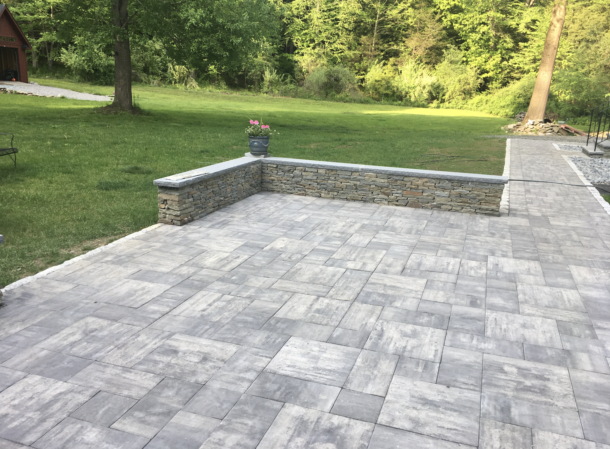 Pavers with seating area that was built from stone
