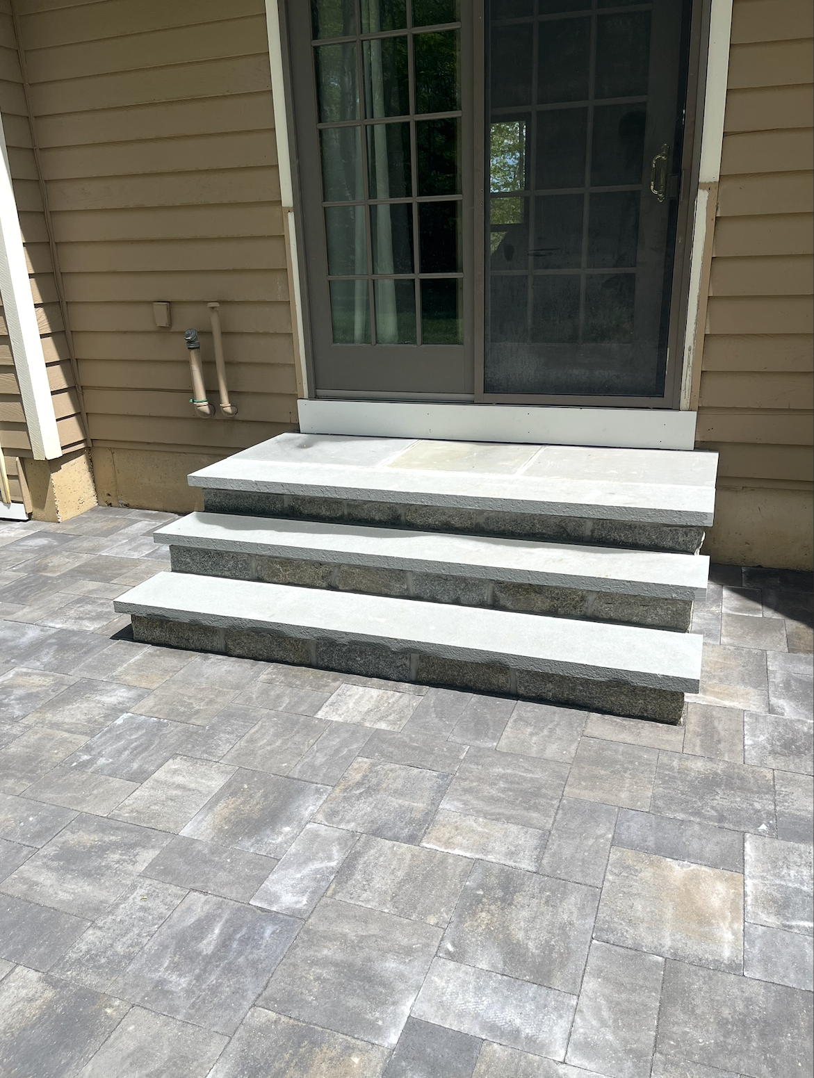 Pavers with 3 stone steps built