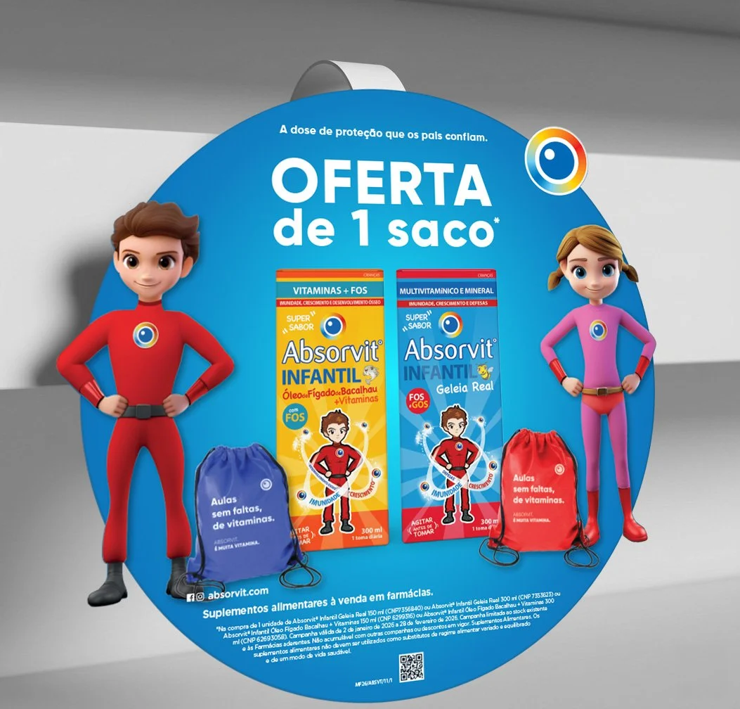 Advertisment for Absorvit children supplements showing two cartoon characters, a boy in a red superhero costume and a girl in a pink superhero costume, with two packs of products and bags of vitamins.