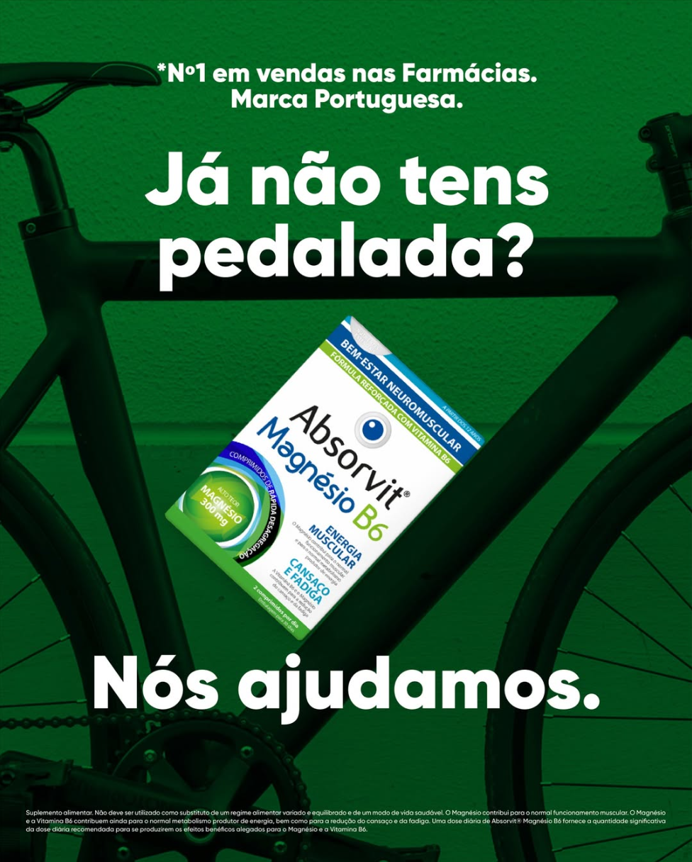An advertisement for Absorvit Magnesium B6 supplement, featuring a green bicycle and bold Portuguese text, promoting its benefits for muscular health and fatigue relief.