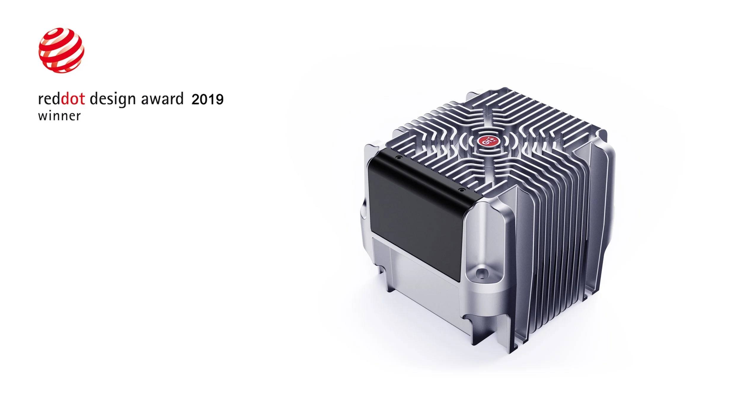 A metallic computer chip with a black label on the side, surrounded by a heat sink with vertical fins, and a red and white logo on the top surface, awarded the 2019 Red Dot Design Award.