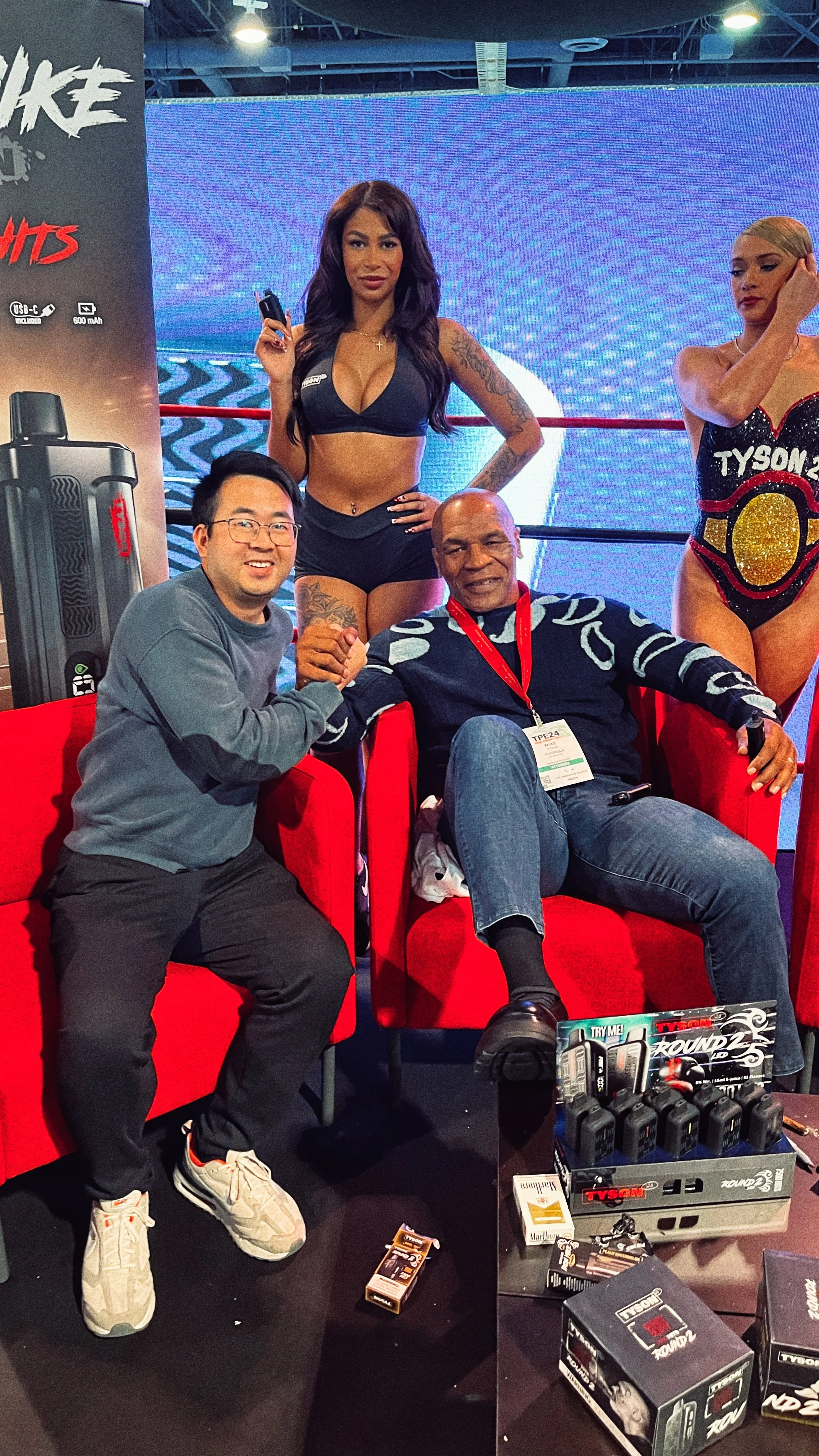 James with Mike Tyson at a hardware launch event. Strategic industrial design and DFM engineering for the TYSON 2.0 global vape brand.