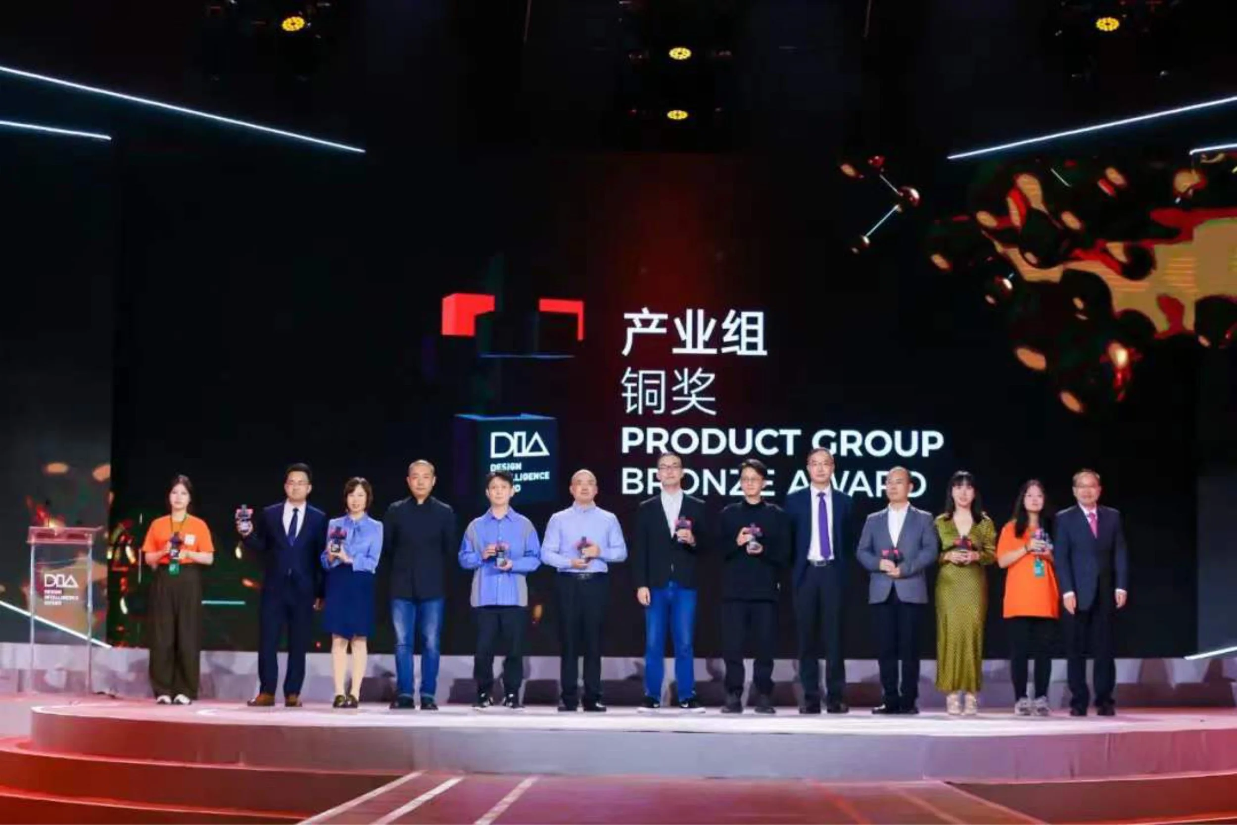 James Design team receiving international design honors. Proven track record in delivering market-ready, award-winning hardware solutions.