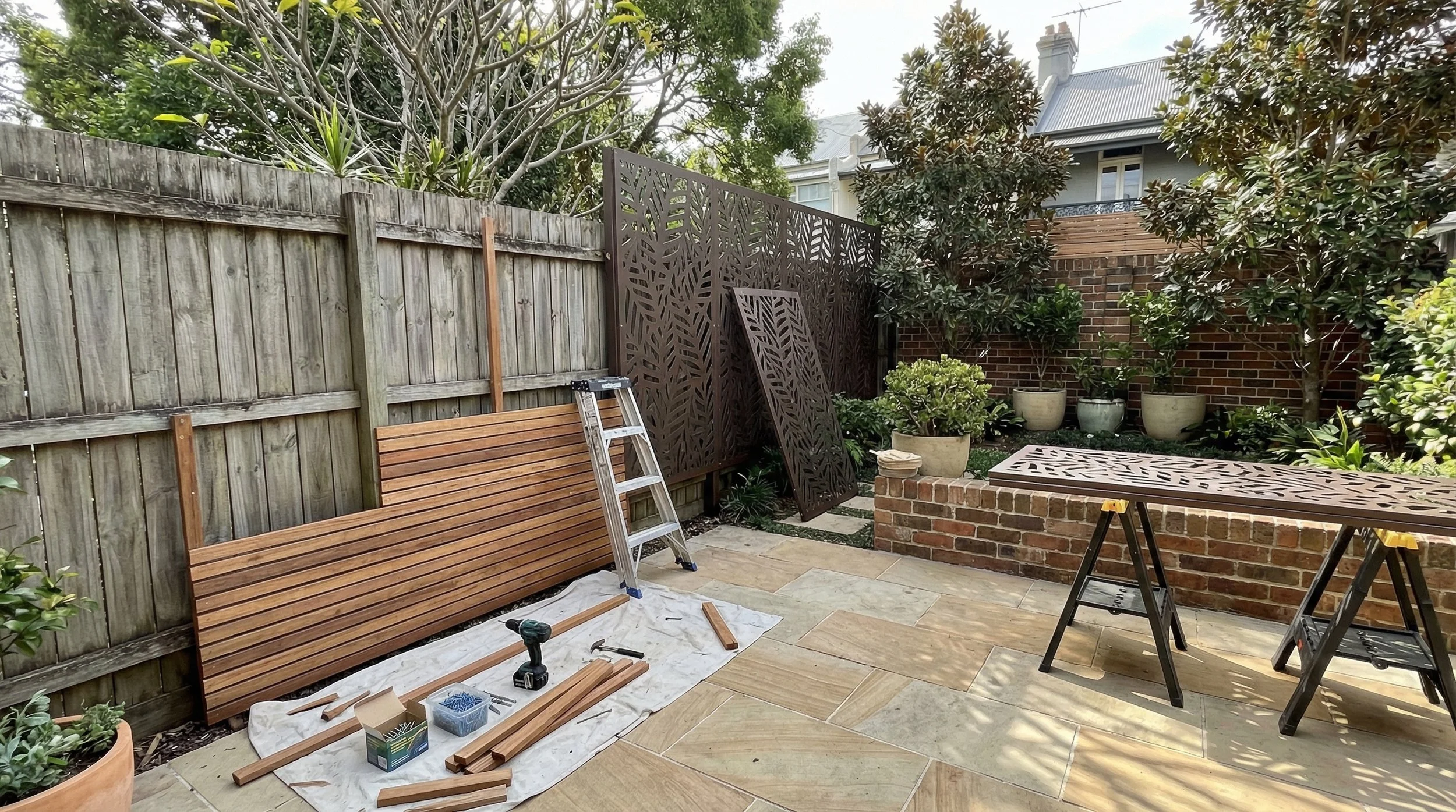 Fence repair and privacy screen installation in outdoor residential area