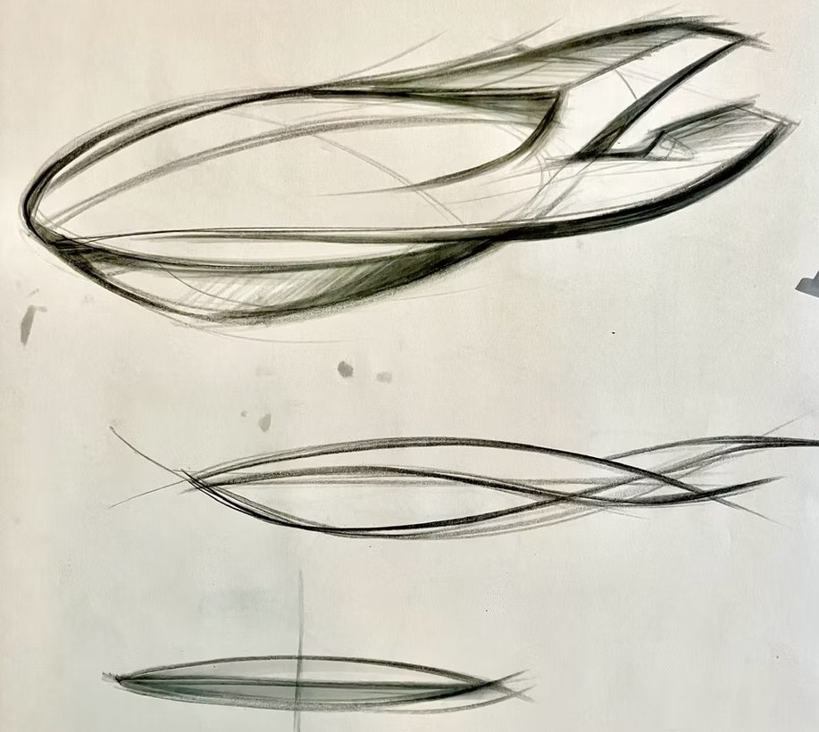 Sketches of speed forms on a white sheet of paper.