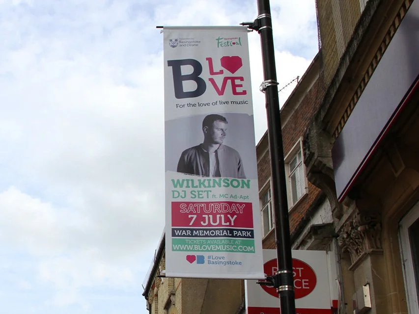B LOVE music festival lamp-post banner promoting Wilkinson at War Memorial Park.