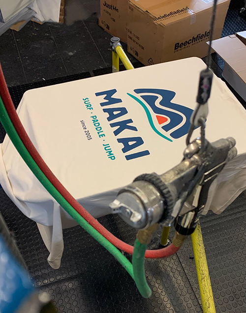 MAKAI branded t-shirt being printed