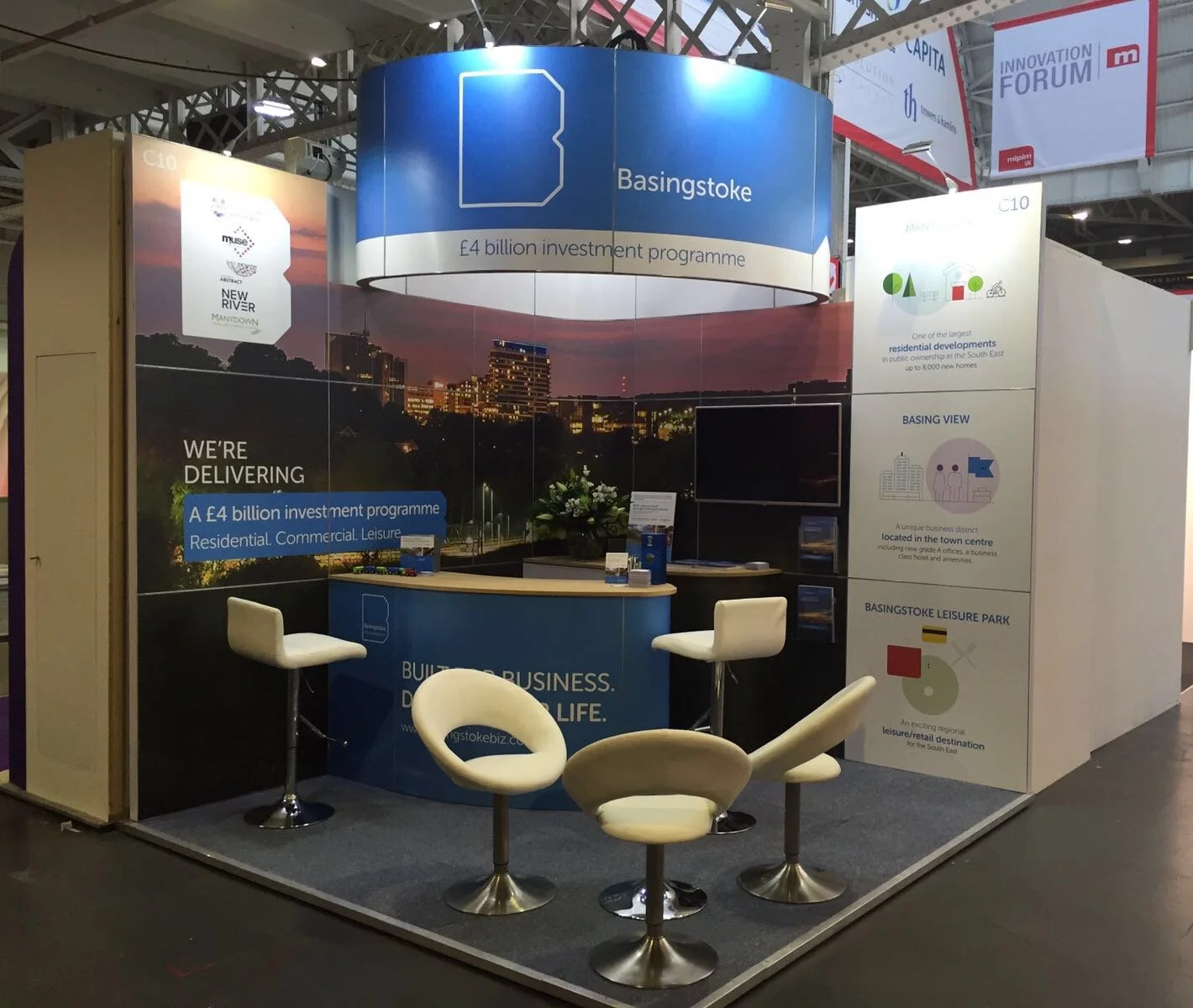 Basingstoke investment exhibition stand with large-format graphics and information panels.