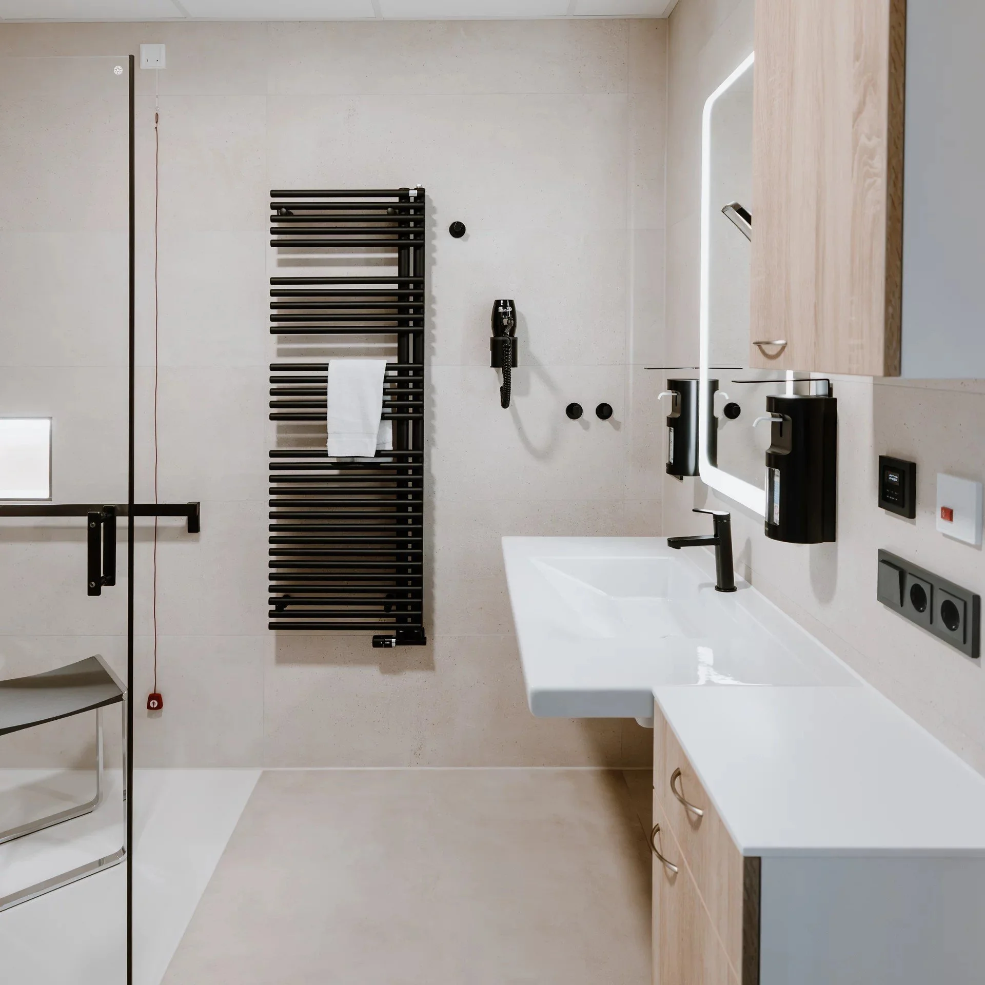 Keuco comfort station accessible bathroom with wheelchair accessible sink