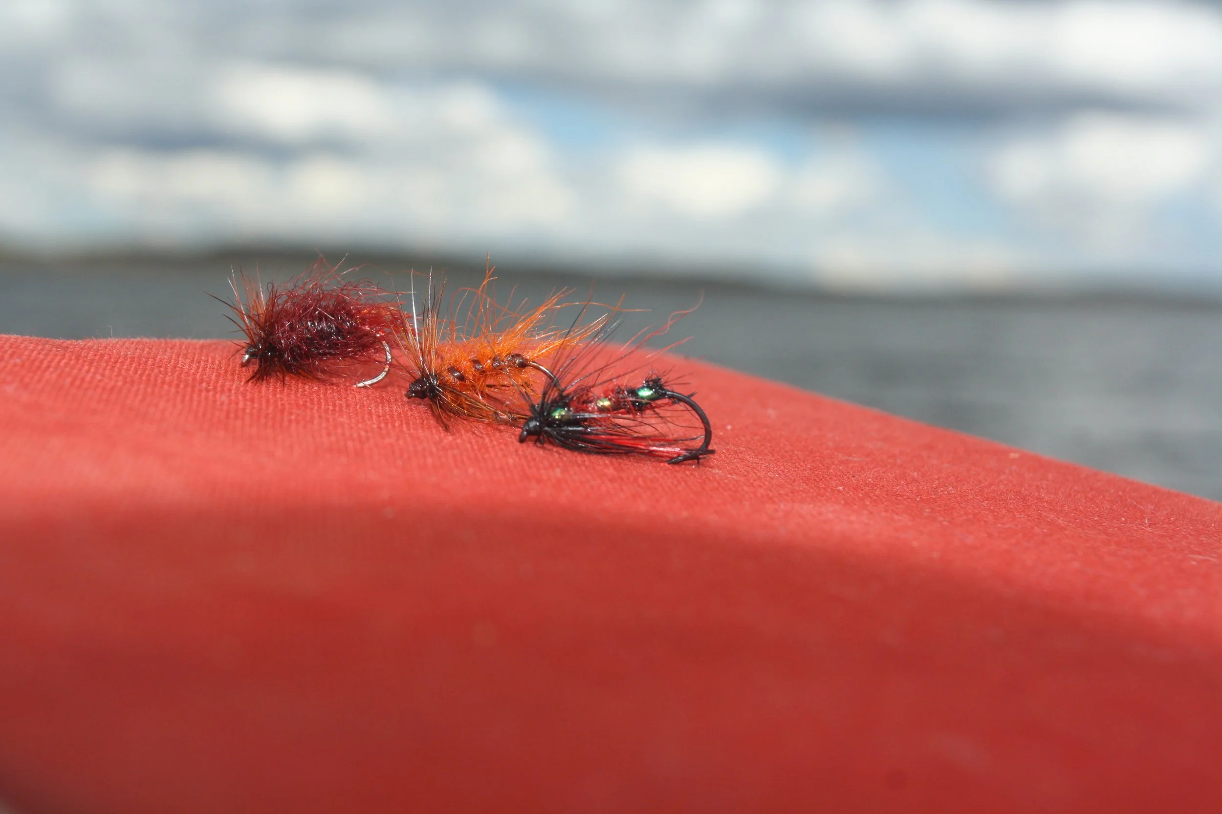 Three of the best English-style dry flies: Jazzed Carrot, Amber Hopper and Bibio Hopper. Three flies when fished as a team will catch fish in just about any brown trout water in Tasmania.