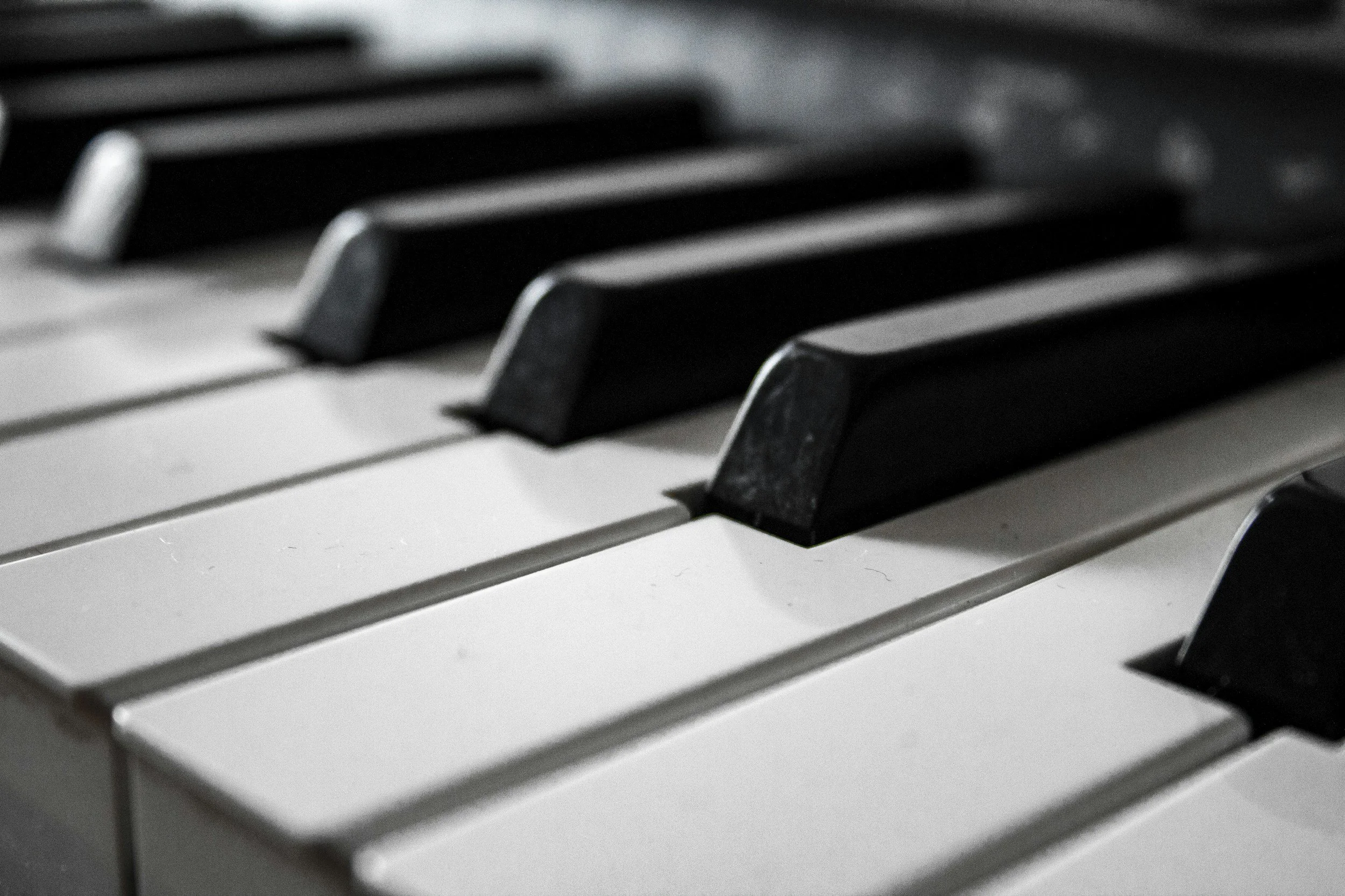 Close-up of black and white piano keys.