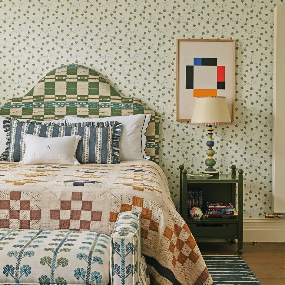 Another confident moment of disruption. A vintage bedspread brings character, while an ingenious mix of fabrics sits comfortably alongside contemporary abstract art.

A symphony of pattern creates depth and texture, balancing tradition with a fresh, 