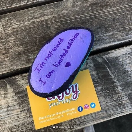 Painted stones with encouraging messages