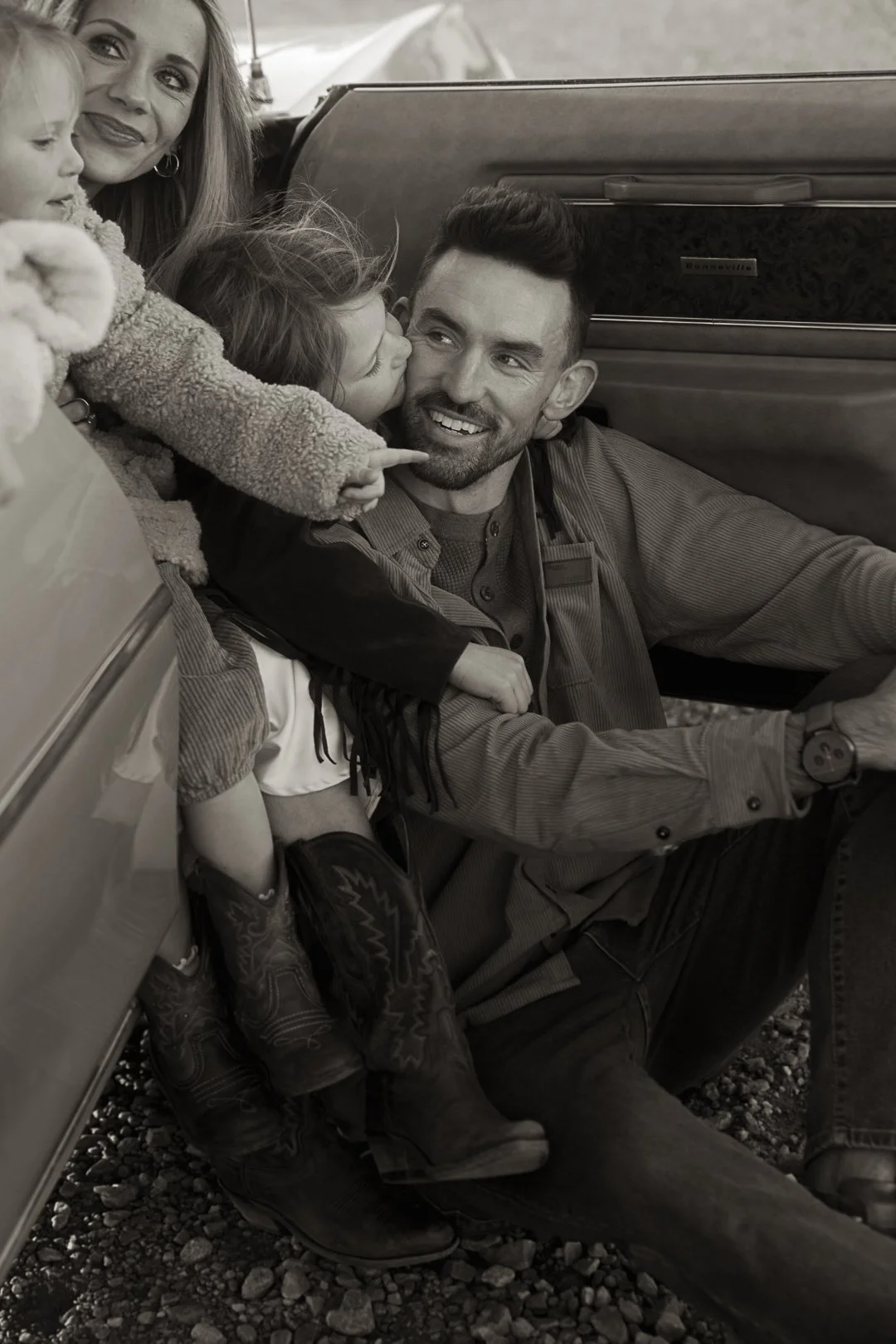 candid family moment inside car storytelling photographer Denver