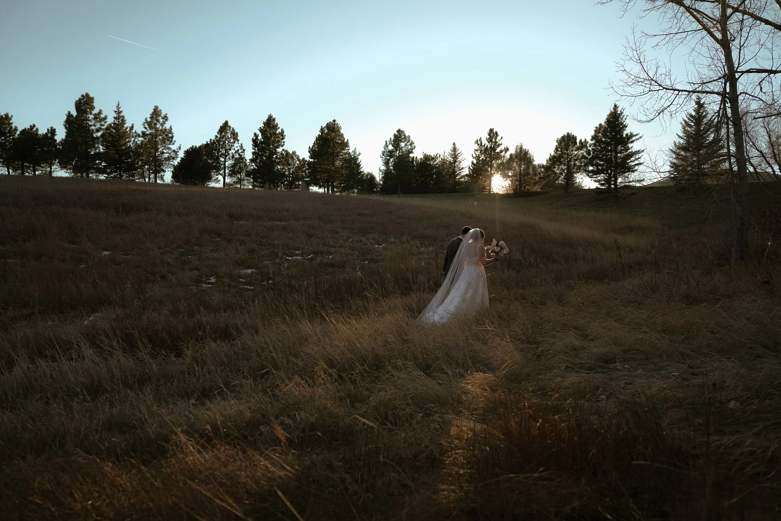 Denver wedding and elopement photographer specializing in intimate, emotional and natural light photography. Capturing honest, timeless moments for modern couples.
