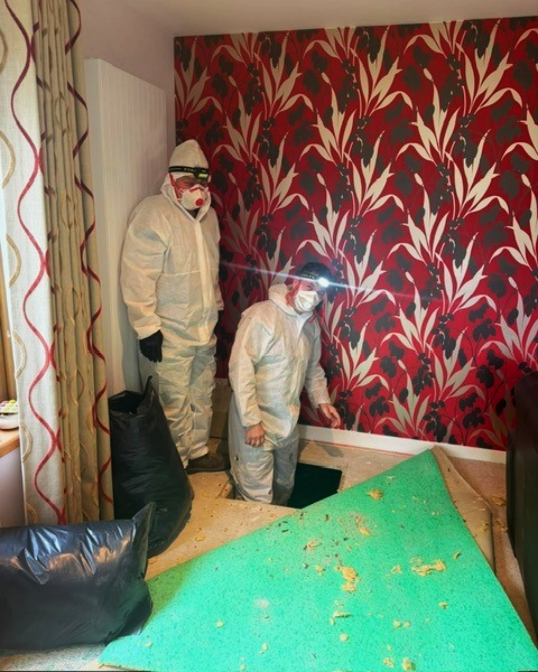 Teaming going into a crawl space to install underfloor insualtion
