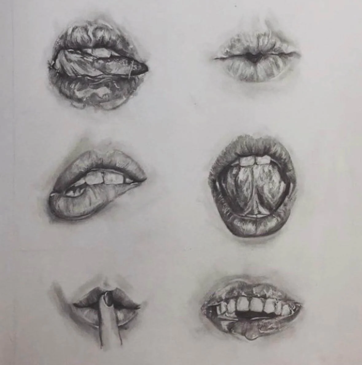 Pencil sketch study sheet showing six detailed drawings of human lips in various expressions and positions — biting, closed, tongue out, wide open, pierced, and drooling. Fine art reference drawing for tattoo design. Siren Tattoo Studio, Lucerne, Swi