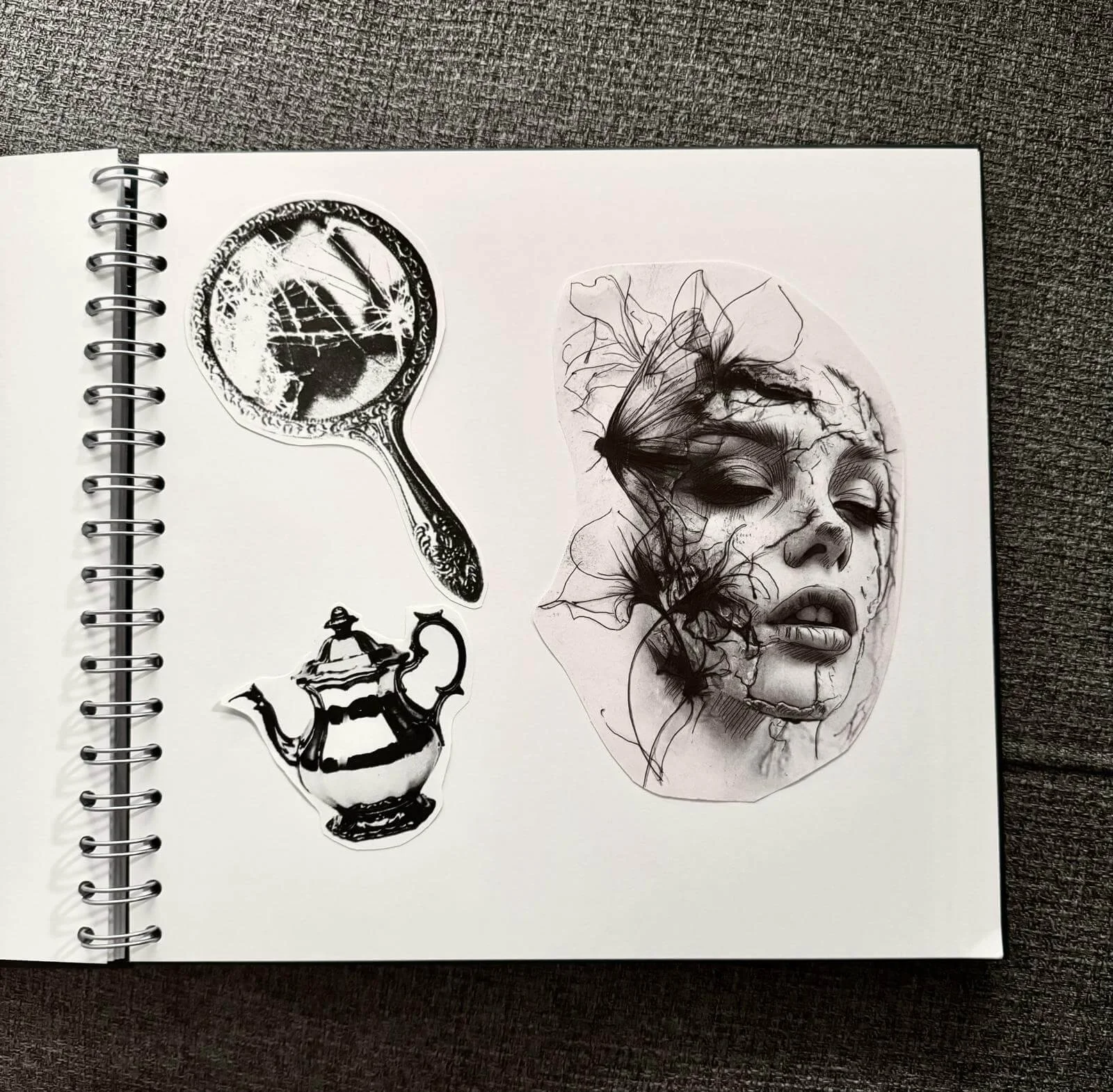 Sketchbook page with dark illustrative flash sticker designs — cracked hand mirror with butterfly, silver teapot, and fragmented female face with moths by Siren Tattoo Lucerne