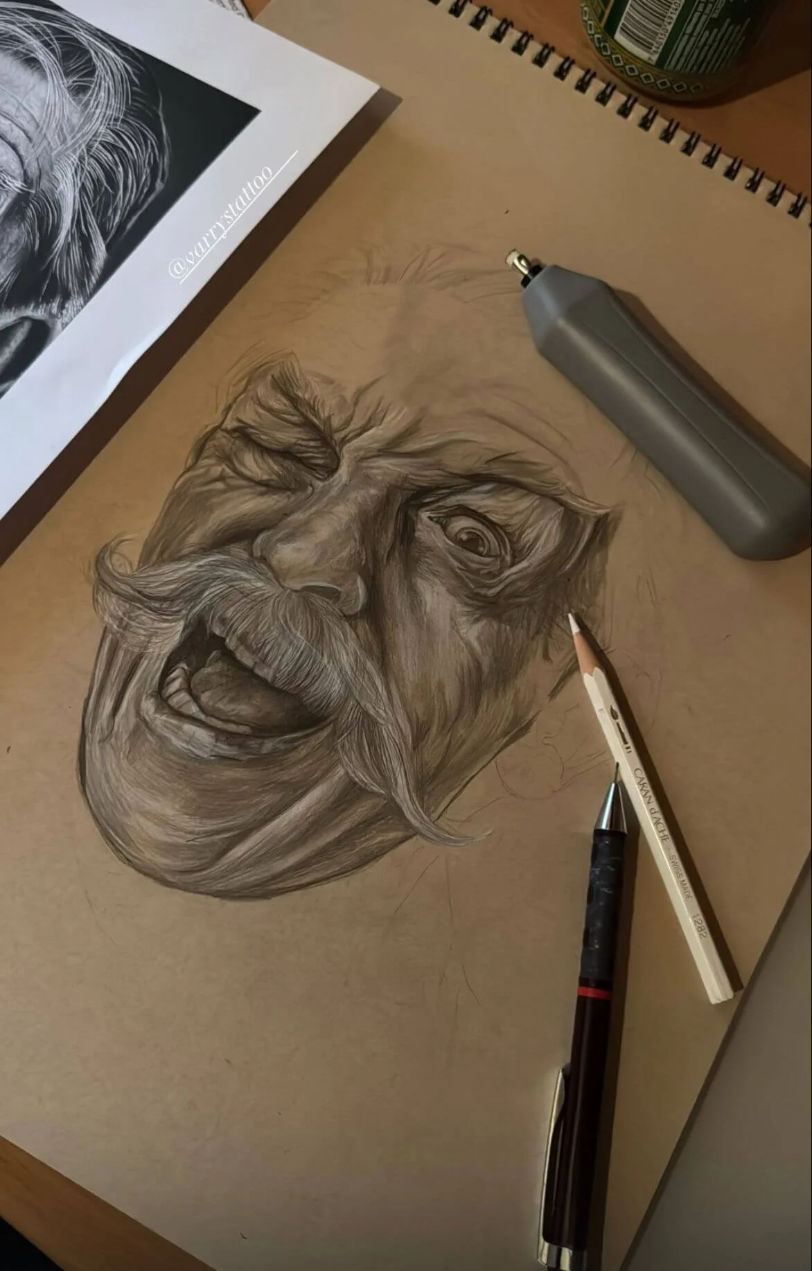 Original pencil drawing in progress — expressive portrait of an elderly man with moustache, sketchbook study by Siren Tattoo  Lucerne