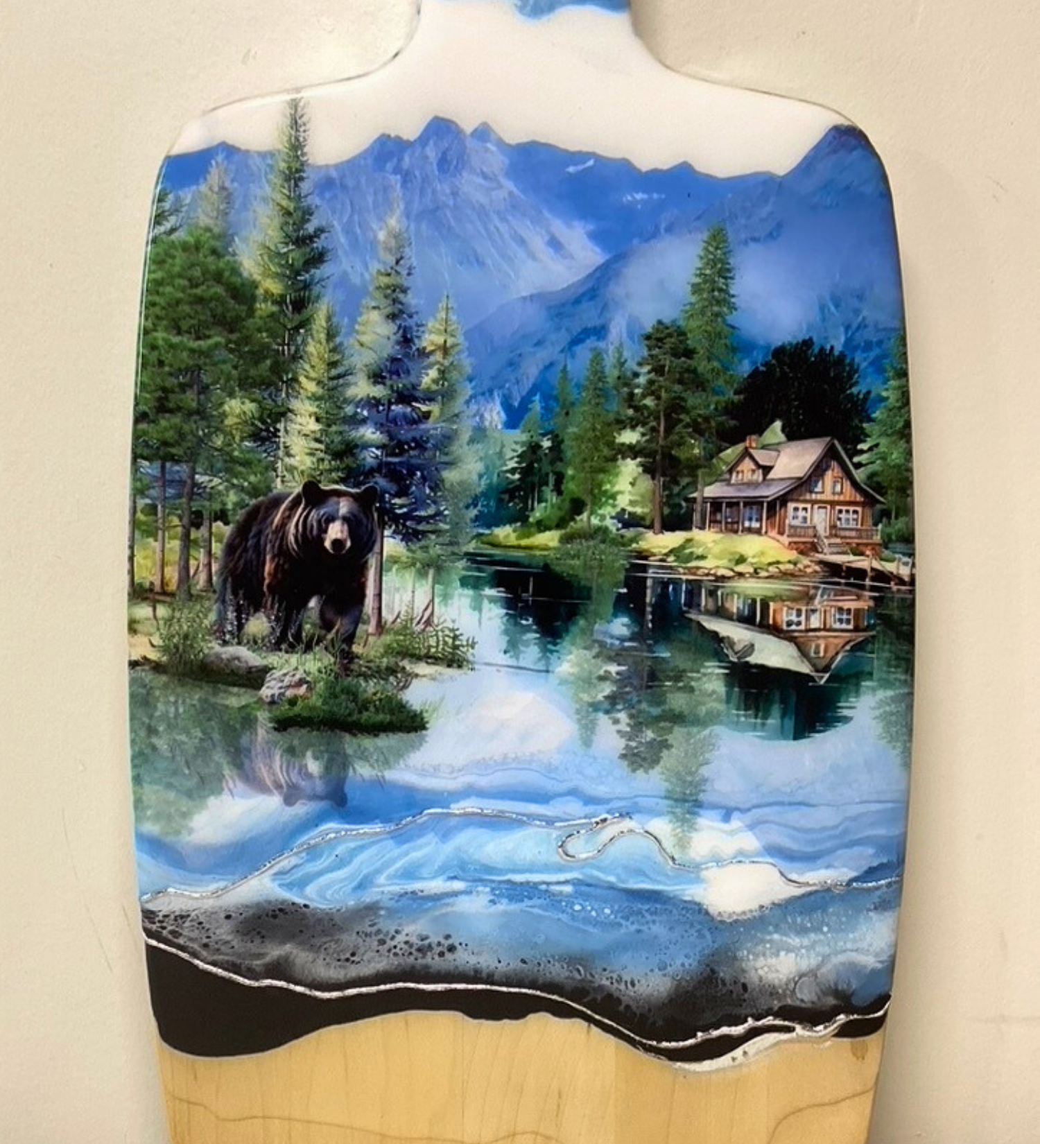 Handcrafted black bear and cabin charcuterie board with resin artwork on maple hardwood serving board.
