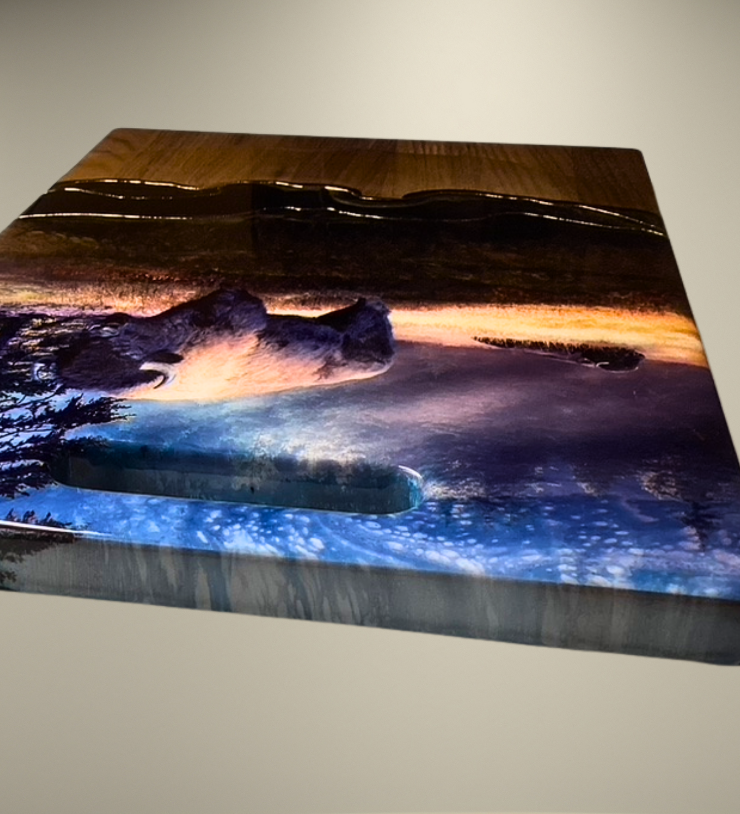 One-of-a-kind walnut charcuterie board featuring a bison prairie scene with hand-painted resin artwork and 24K gold accents. Functional Western art for entertaining.