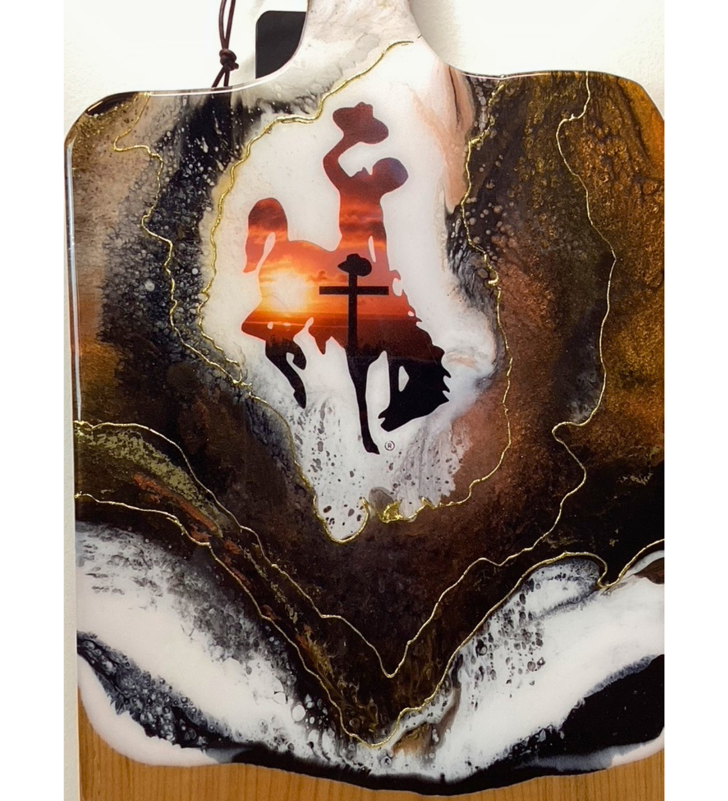 Handmade Wyoming Cowboy charcuterie board with cross and sunset design, gold resin artwork on hardwood serving board