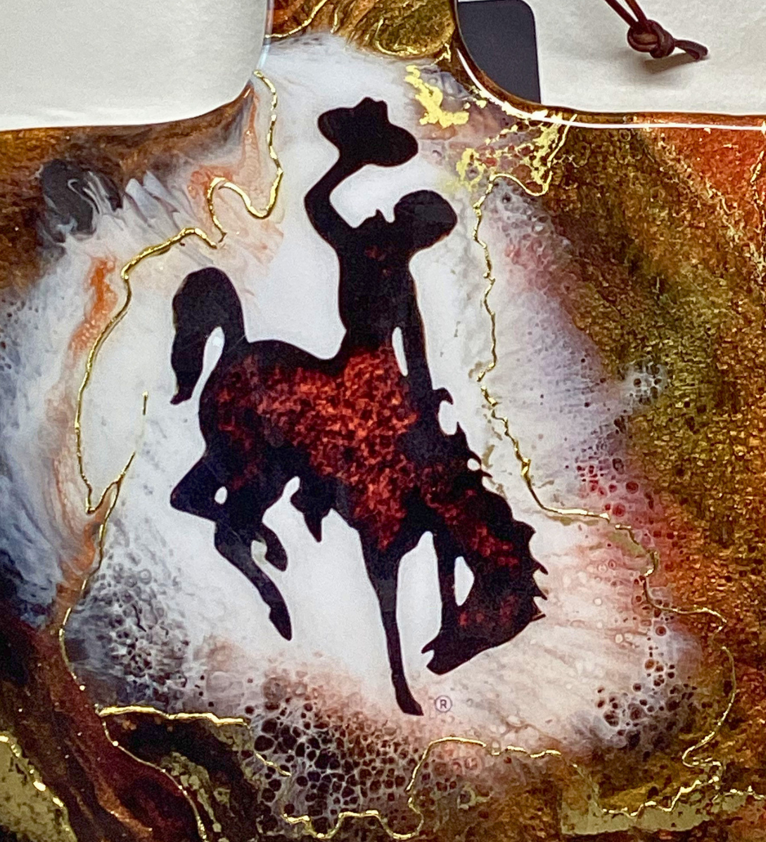 Handmade Wyoming Cowboy charcuterie board with resin art and 24K gold accents. A one-of-a-kind serving piece that doubles as Western wall art.