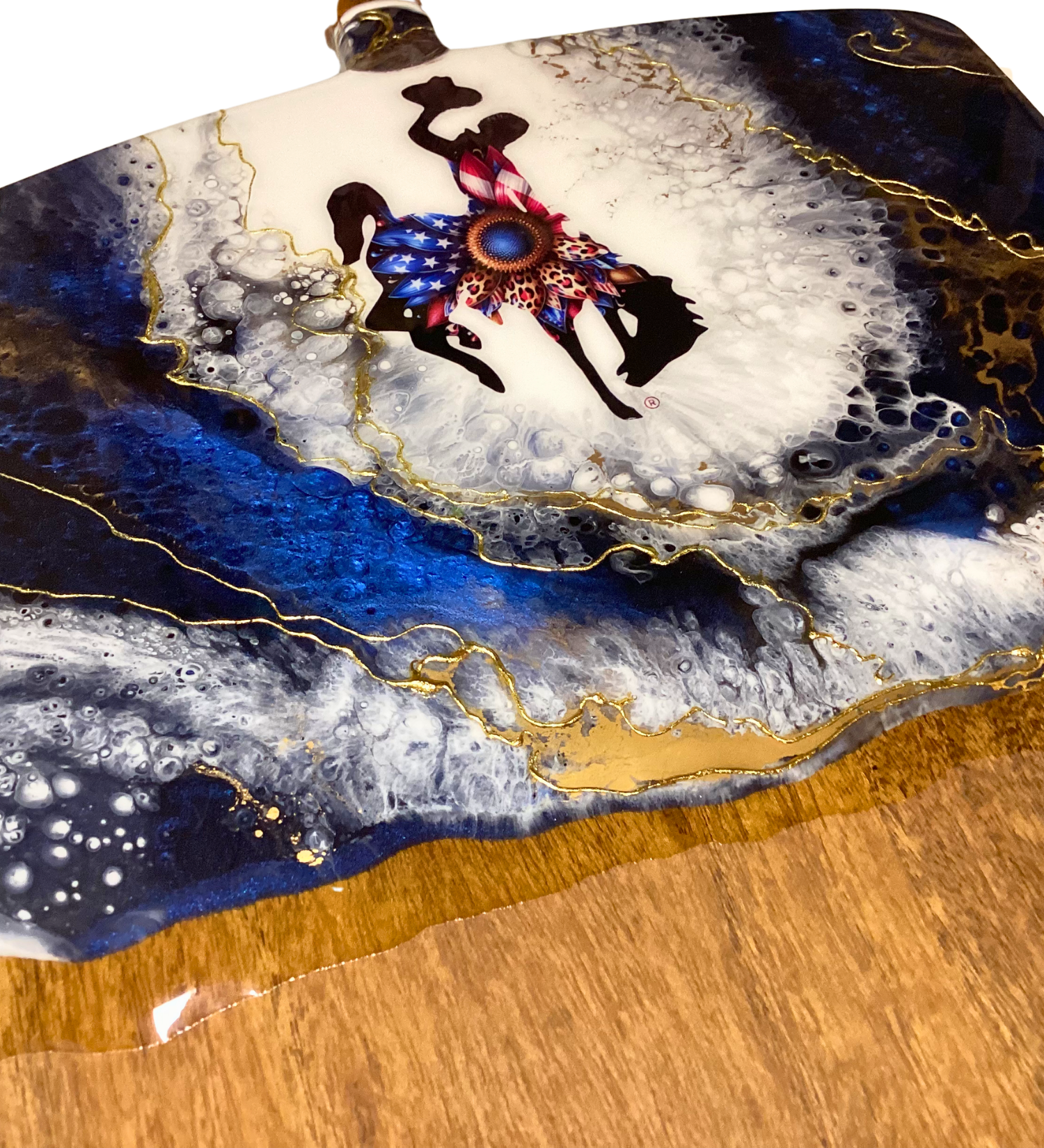 Handmade Wyoming bucking horse charcuterie board with patriotic design and 24K gold accents on acacia wood