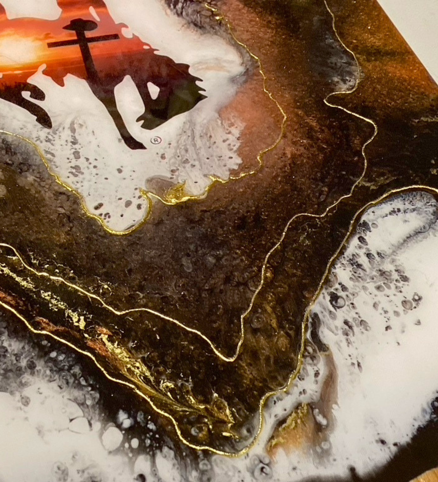 Handmade Wyoming Cowboy charcuterie board with cross and sunset design, gold resin artwork on hardwood serving board