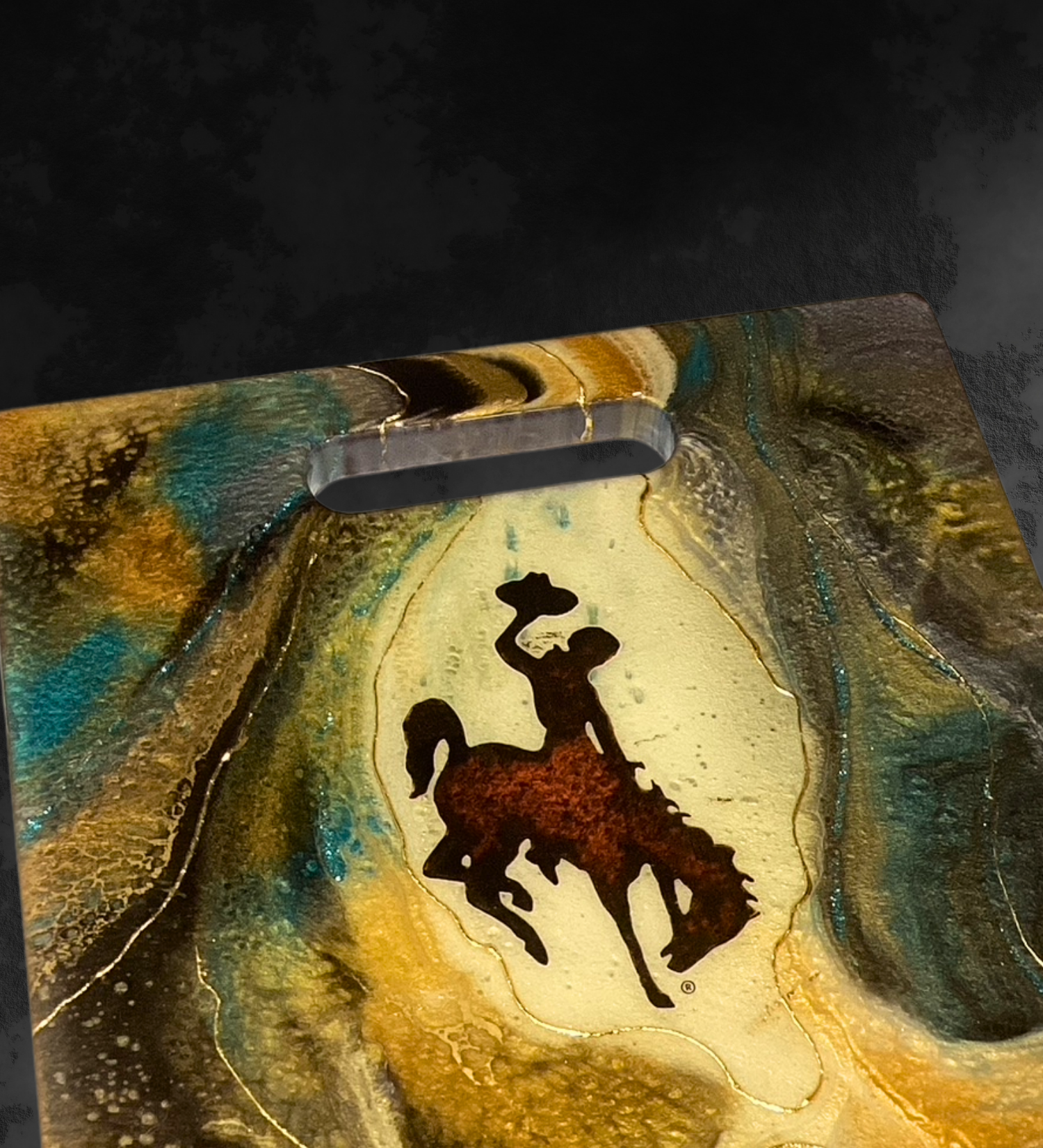 Handcrafted Wyoming cowboy charcuterie board featuring flowing resin art on walnut hardwood.
