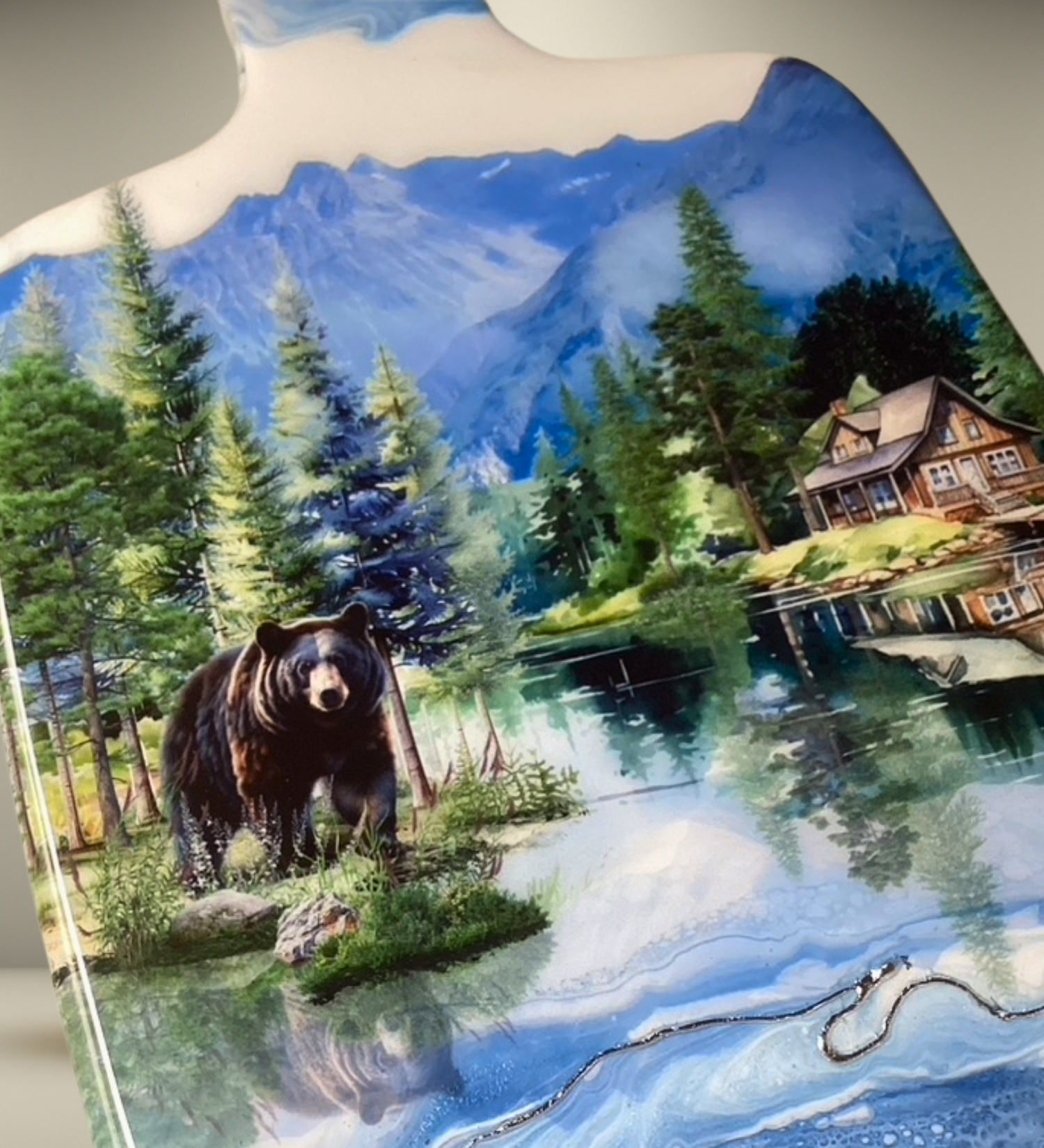 Handcrafted black bear and cabin charcuterie board with resin artwork on maple hardwood serving board.