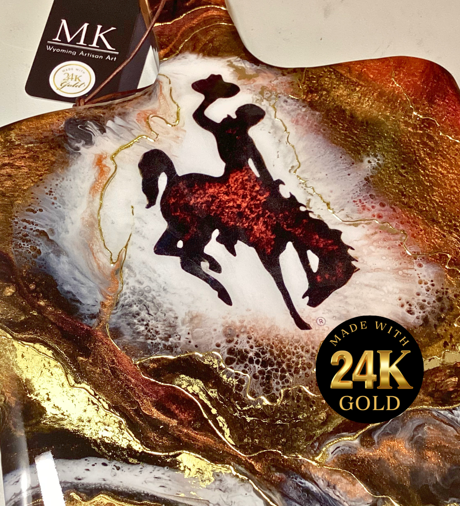 Handmade Wyoming Cowboy charcuterie board with resin art and 24K gold accents. A one-of-a-kind serving piece that doubles as Western wall art.