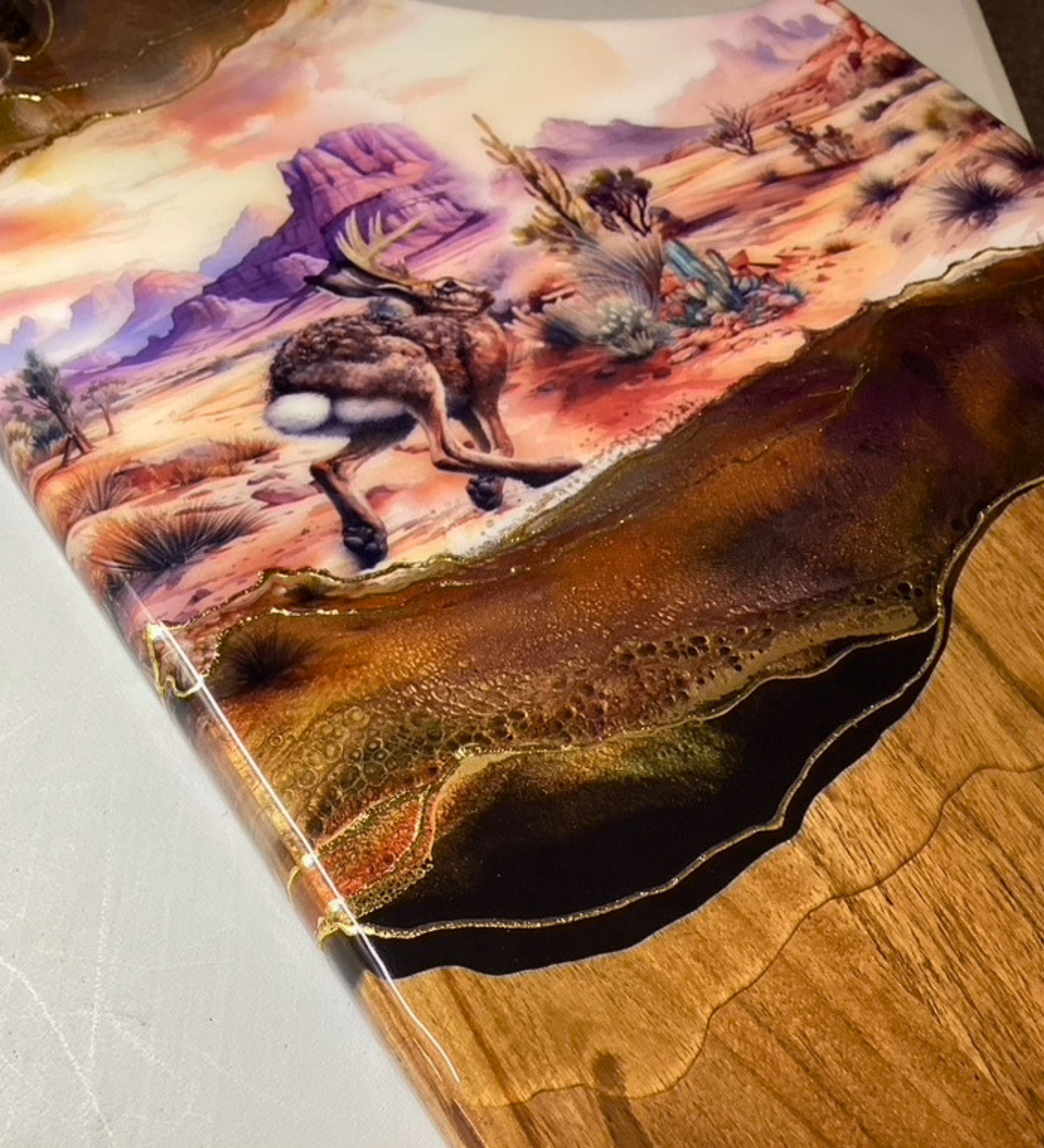 Handmade jackalope charcuterie board with desert scene, 24K gold accents, and acacia wood. One-of-a-kind functional art piece.