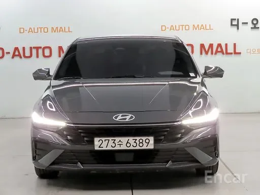 Gray Hyundai car with a license plate 273수6389 parked indoors, with D-AUTO MALL signage in the background.