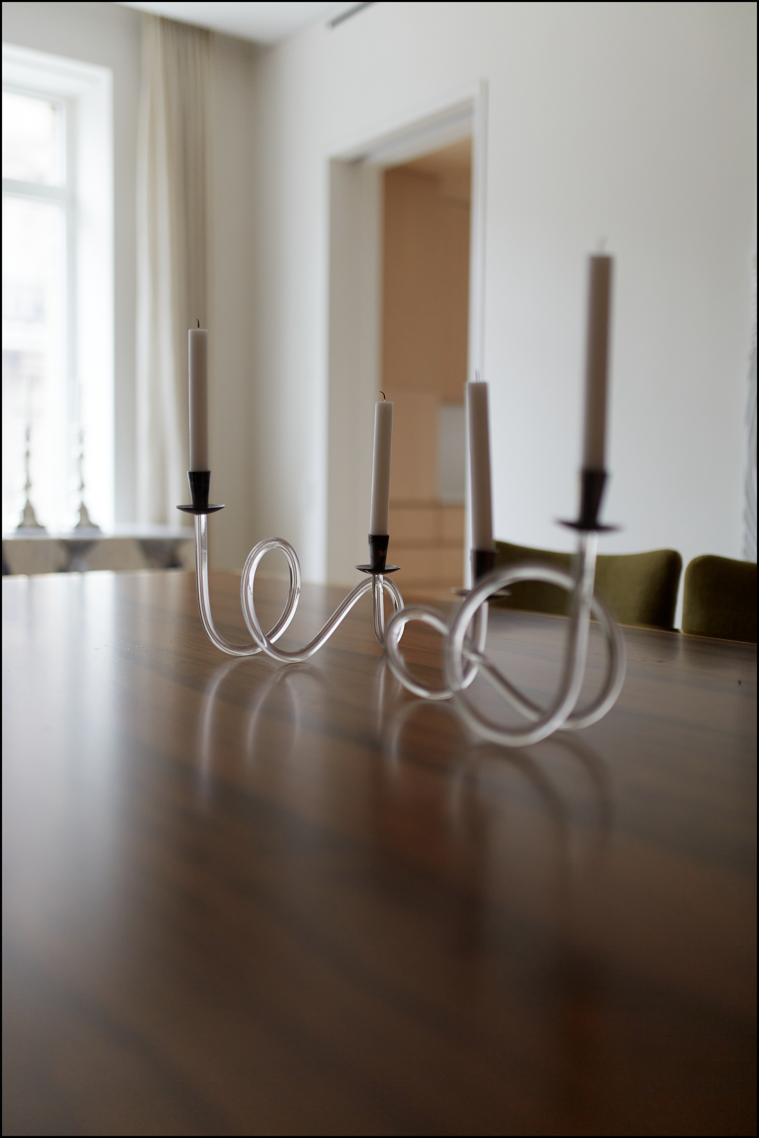 handmade-dining-room-table-with-glass-candlesticks.png