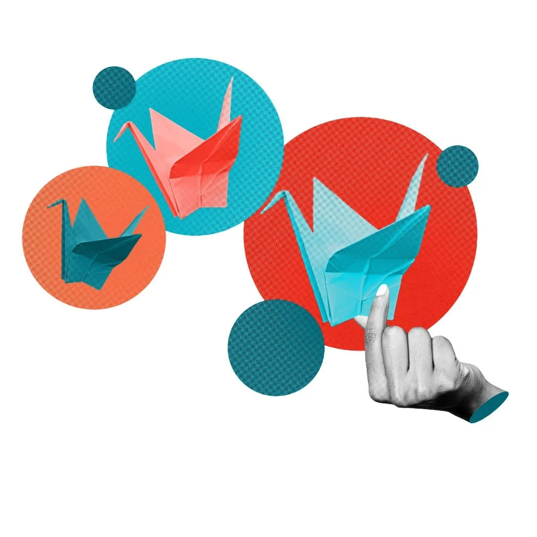 A hand with a finger pointing at a blue origami paper crane, surrounded by four colored circles containing more origami cranes in pink and blue, with a digital or graphic design style.