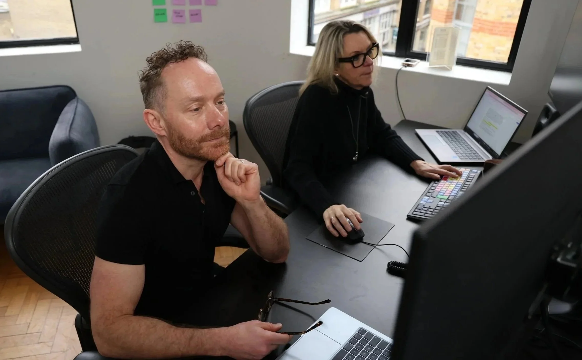 TV producer Paul Durgan with editor Lorraine Want in an edit crafting a story