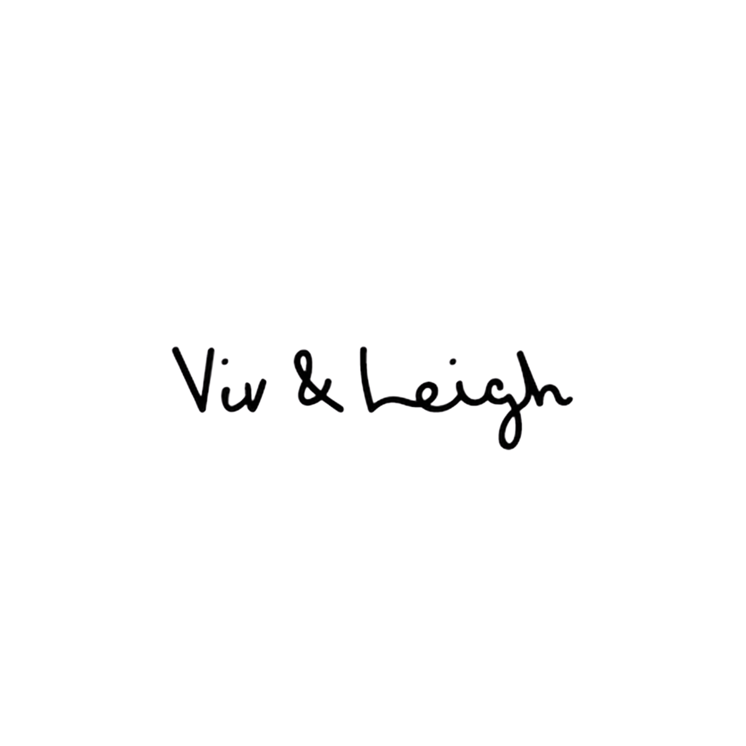 Close-up of a neon sign with the words "Valentine" written in cursive, illuminated in purple and pink colors.
