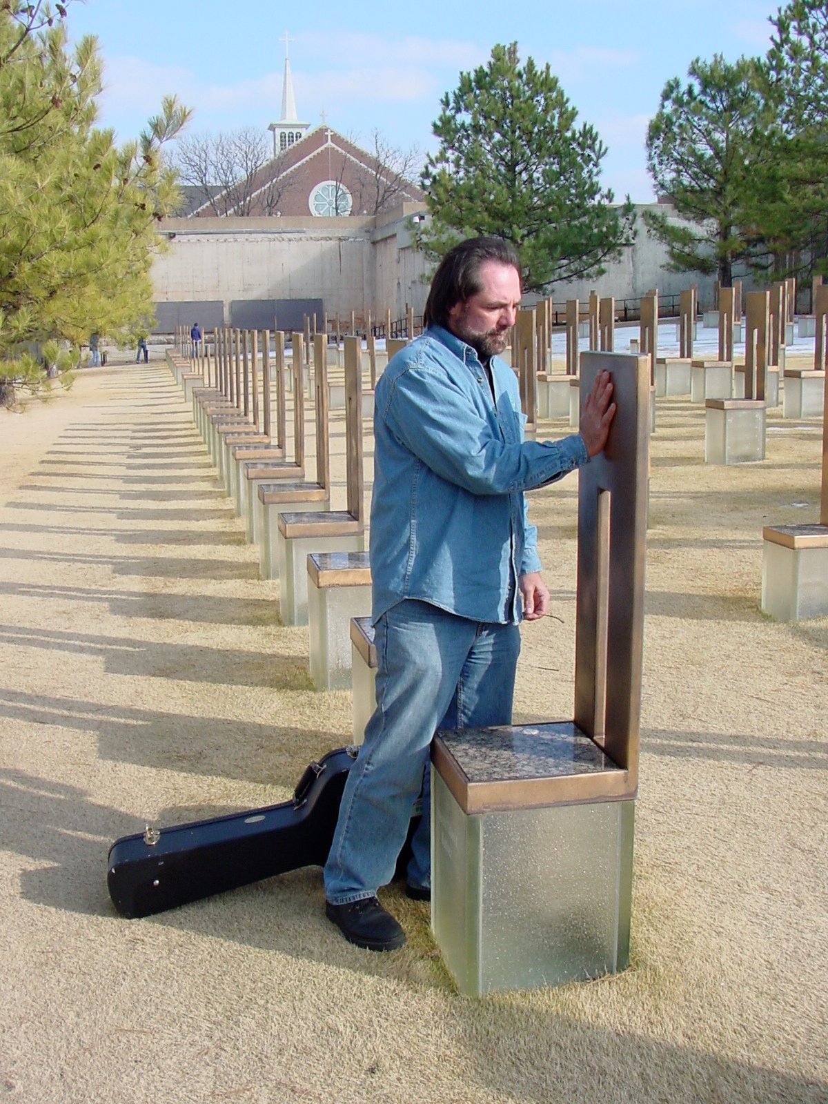 Oklahoma City — Pausing at the Memorial to honor those lost and to listen to frontline caregivers speaking about trauma and peace.