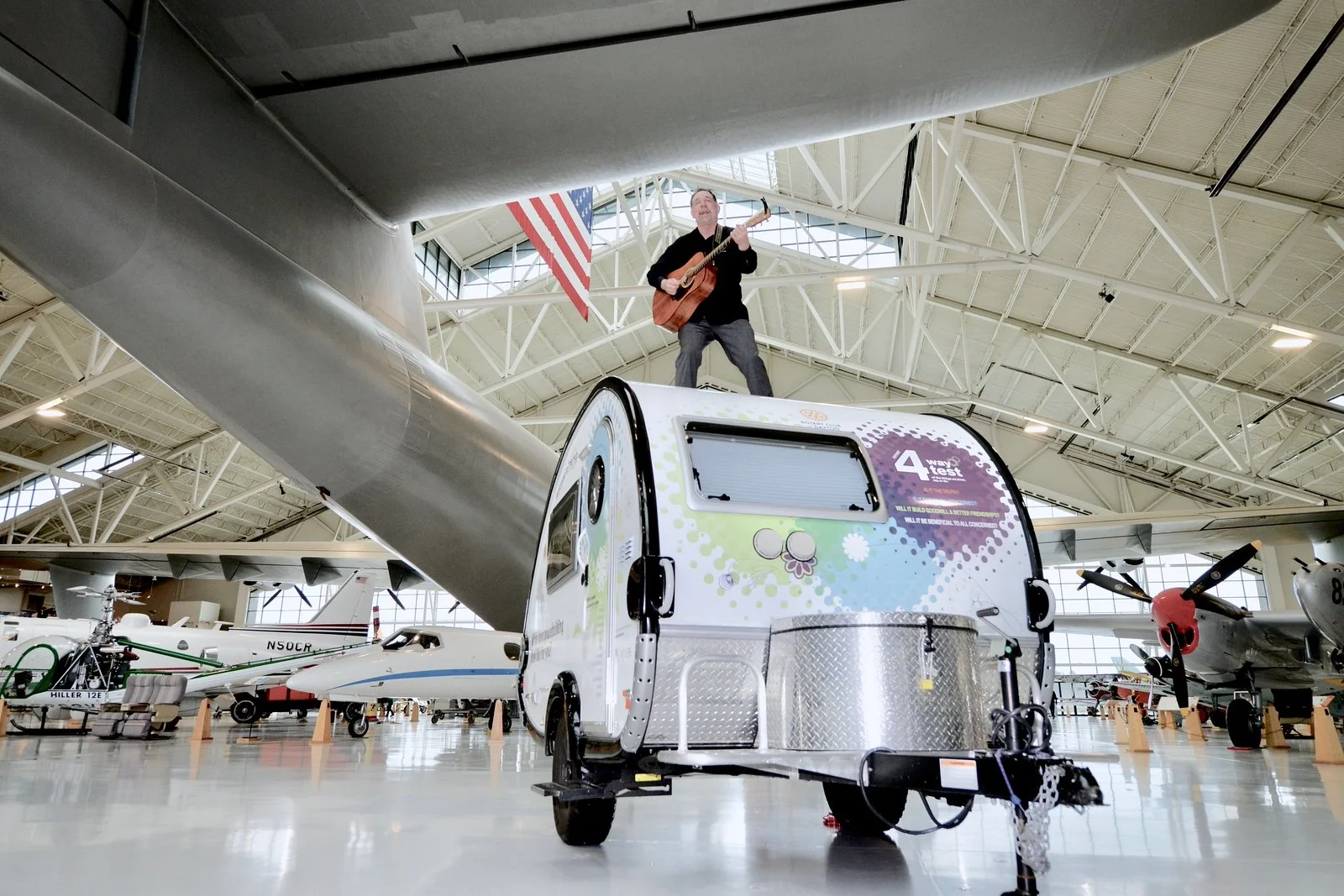 McMinnville, OR — Performing atop the Peacebuilder Hub beneath the wings of the Spruce Goose at the Air & Space Museum.