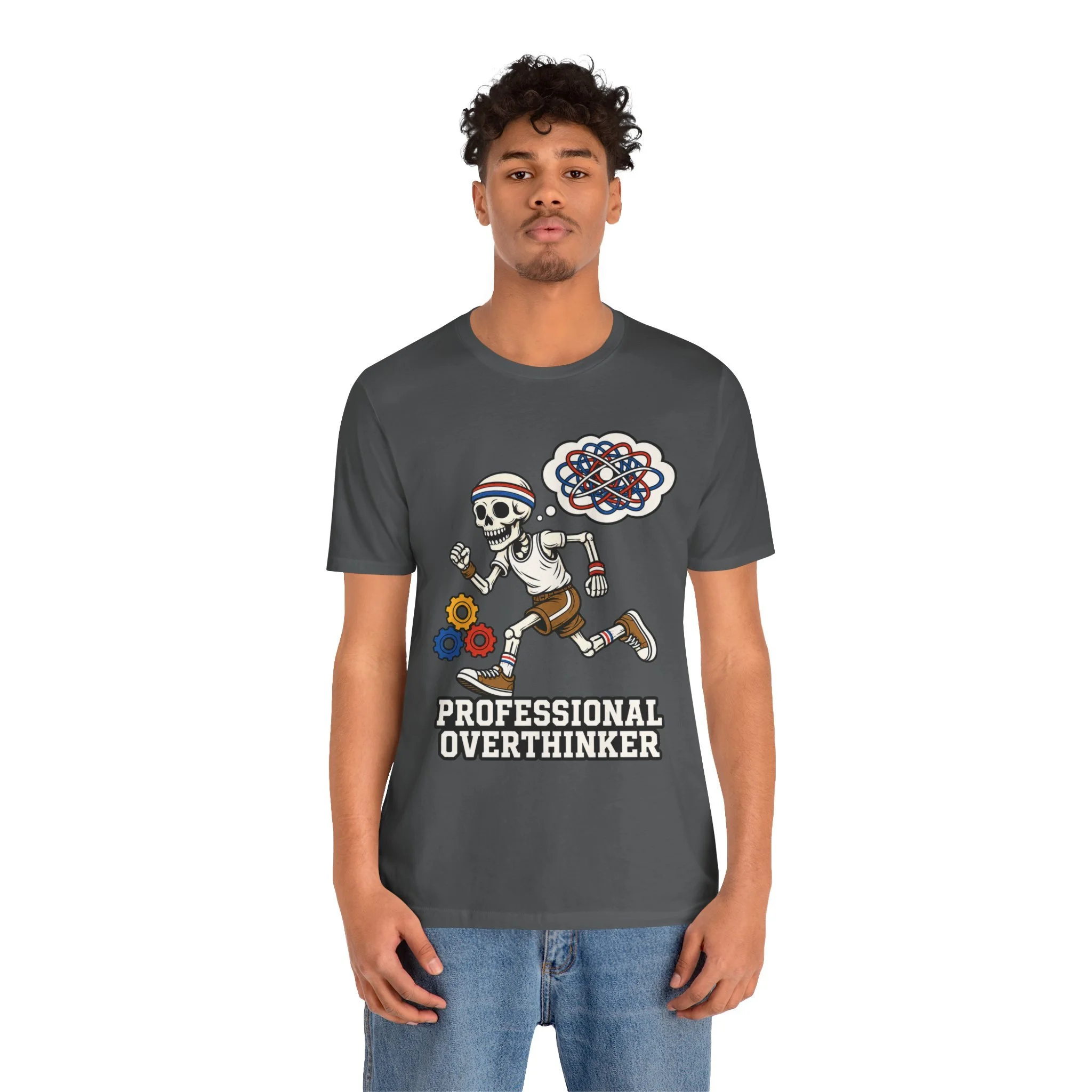 Model wearing the charcoal Professional Overthinker T-shirt, featuring a running skeleton beneath a tangled thought bubble.