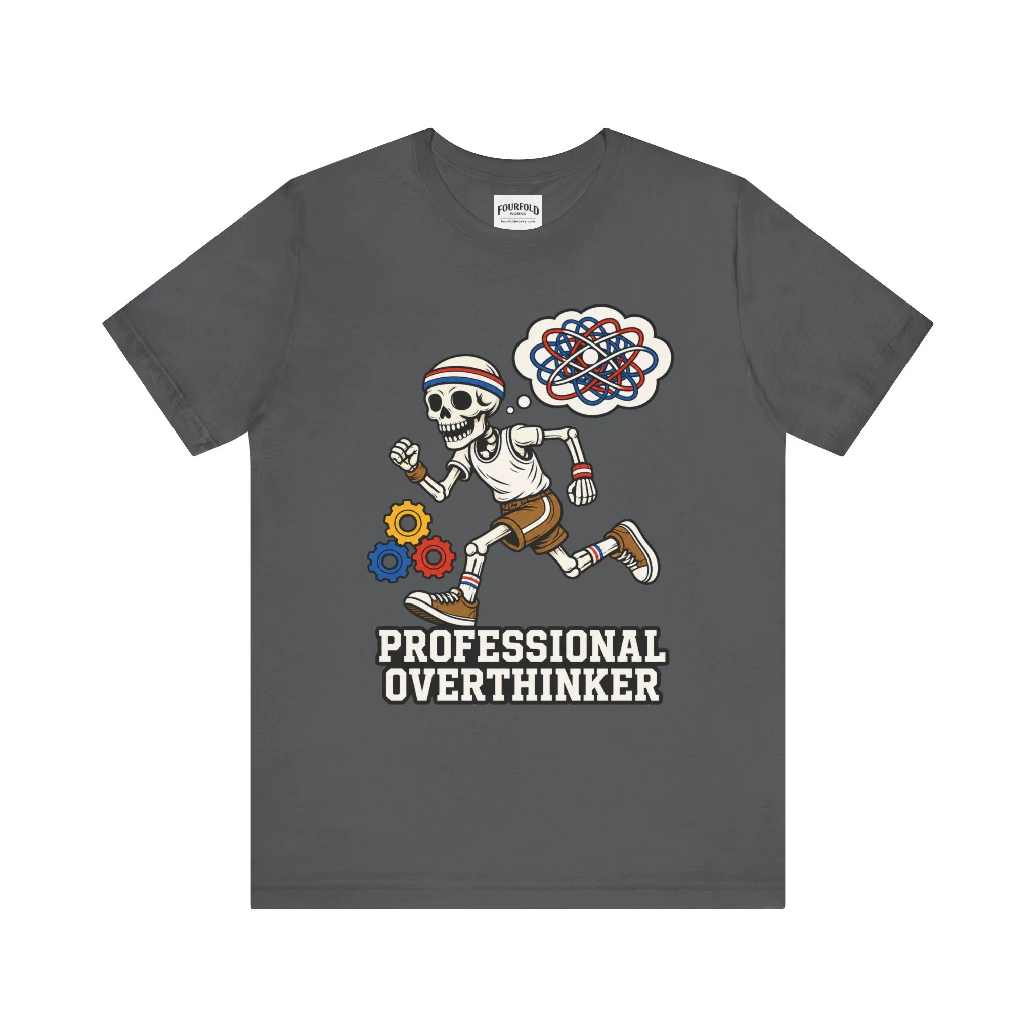 Front of the charcoal Professional Overthinker T-shirt with running skeleton and thought-bubble artwork.