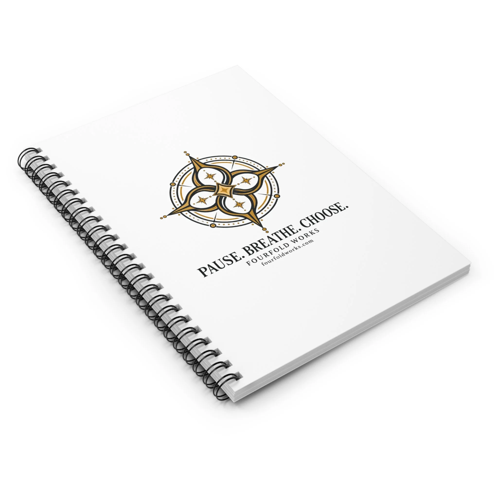 Angled view of the Fourfold Practice notebook showing its printed front cover and metal spiral.