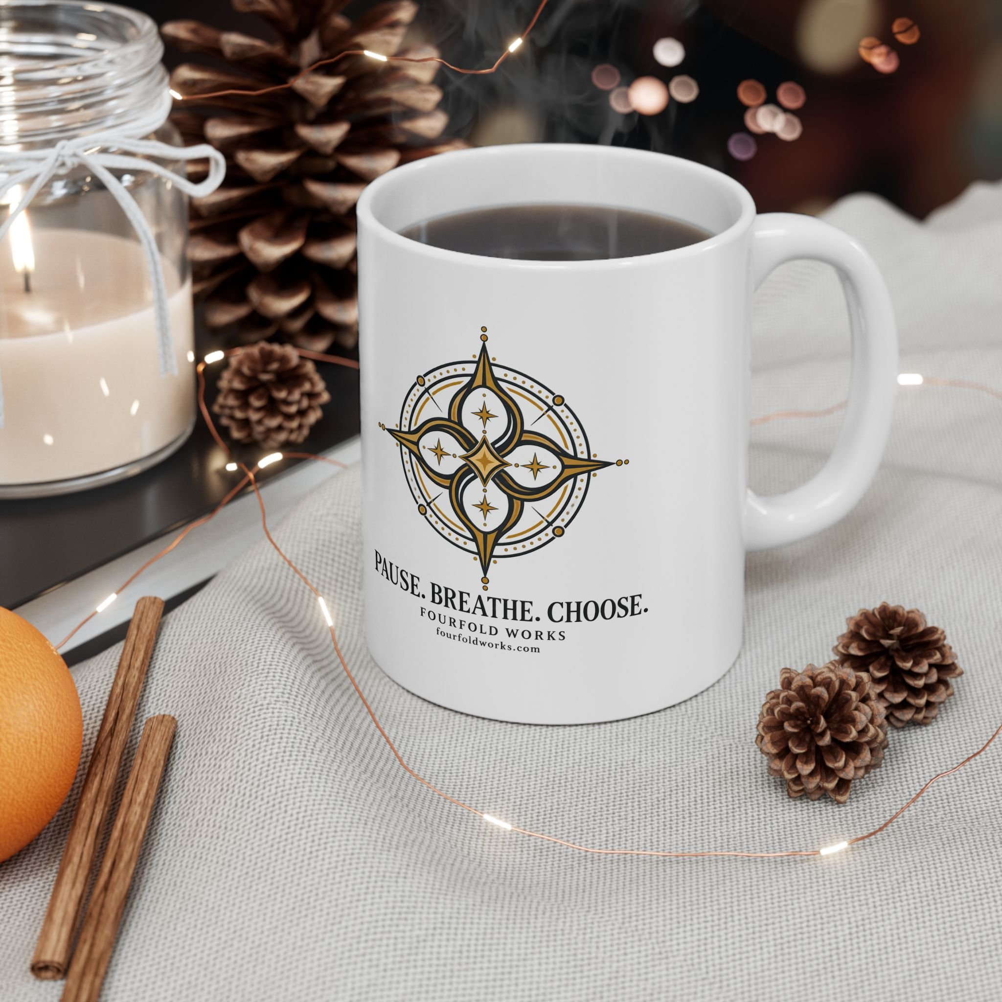 Pause. Breathe. Choose. mug in a coffee-themed setting with beans, jars and pinecones.