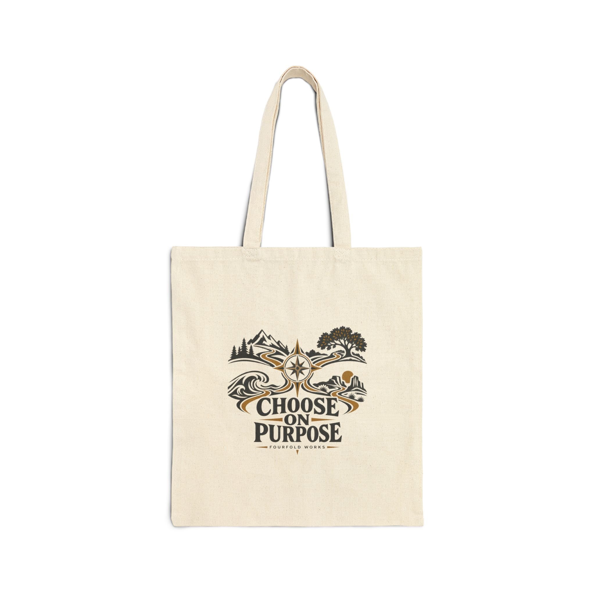 Front of the natural canvas Choose on Purpose tote with mountain-path artwork and Fourfold Works lettering.