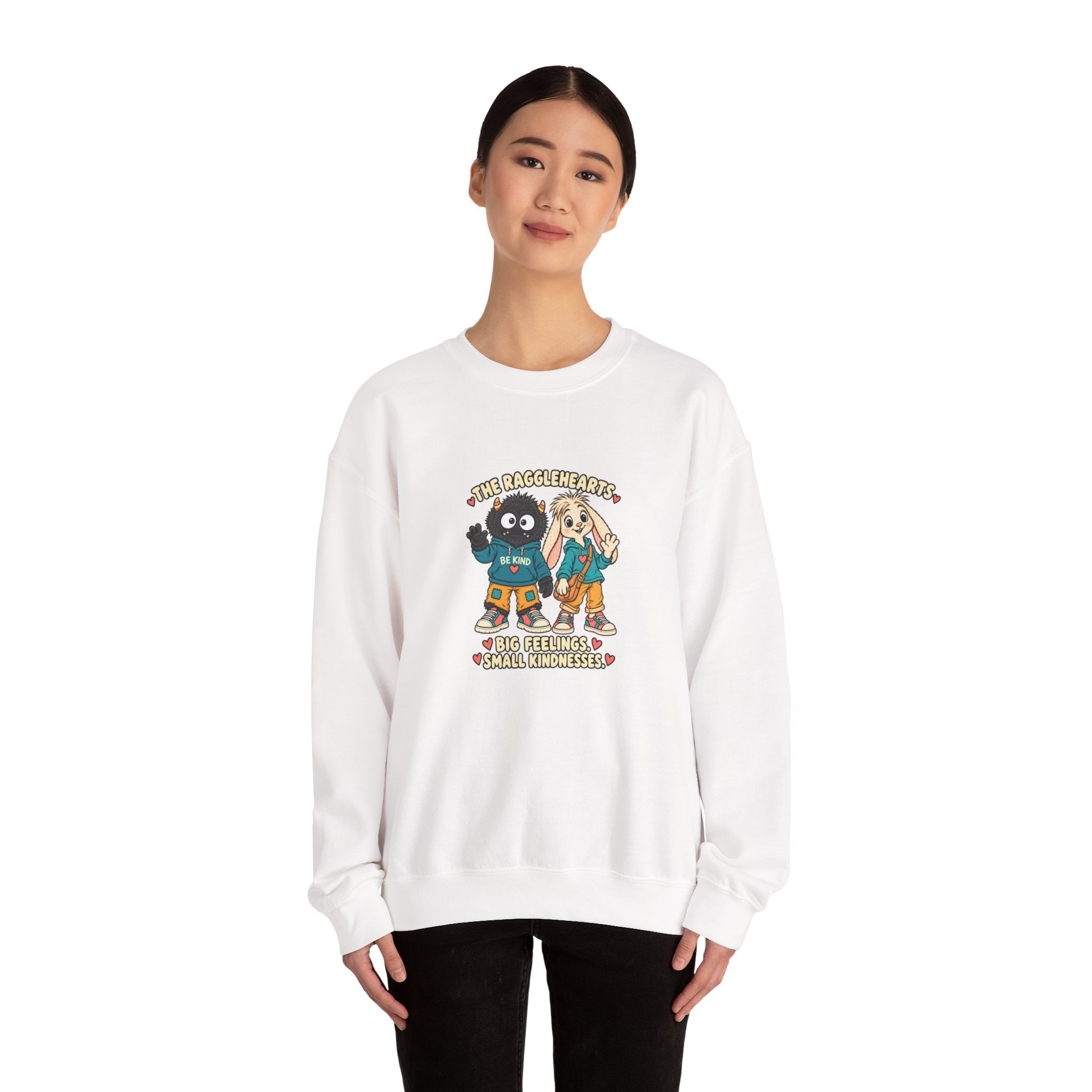 Model wearing the white Big Feelings. Small Kindnesses. sweatshirt, shown from the front.