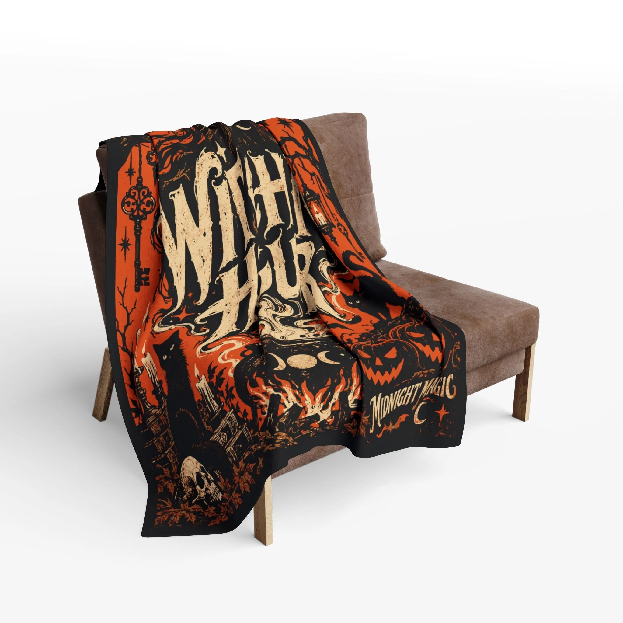 Witching Hour fleece blanket draped over a chair with its central lettering and Halloween motifs visible.
