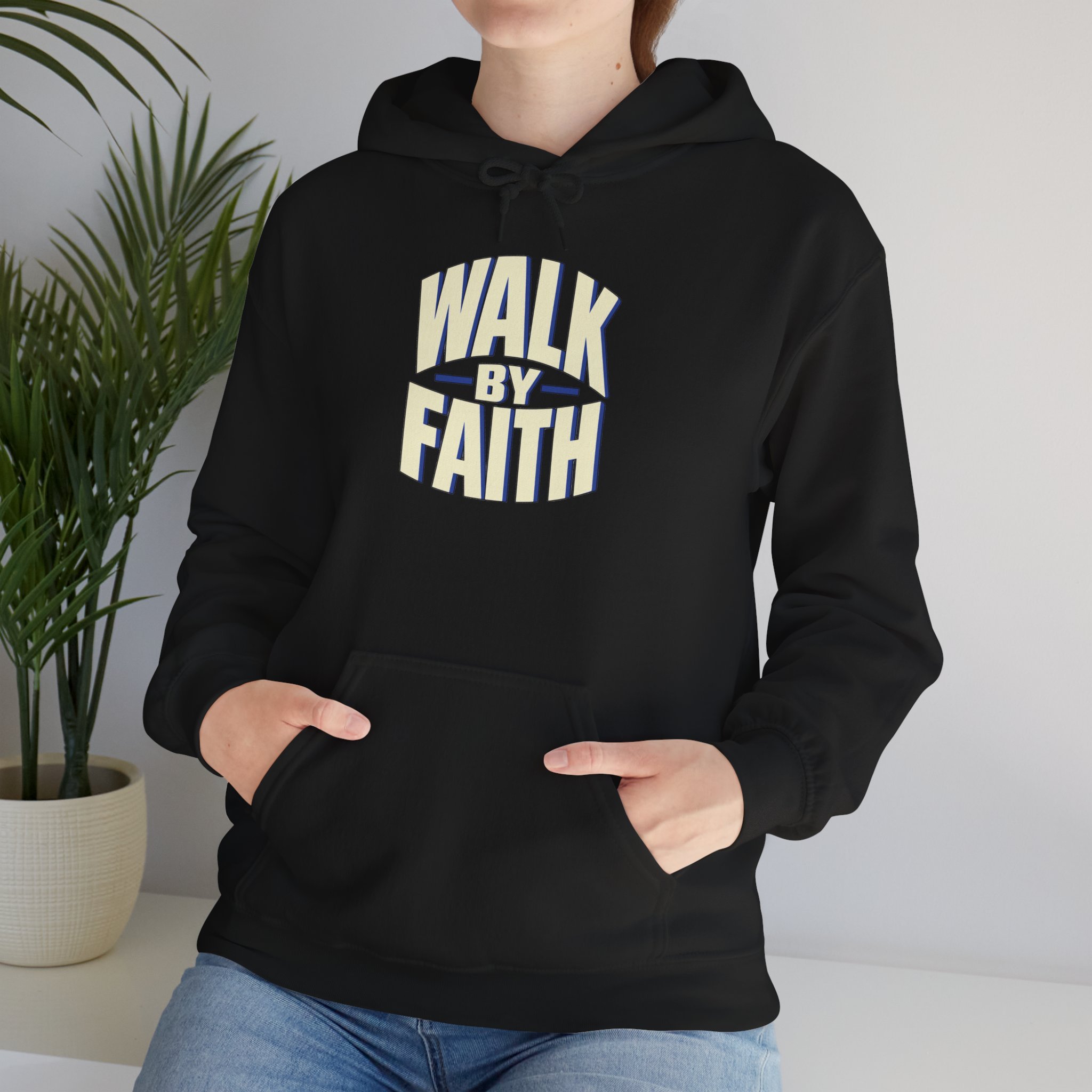 Model wearing Black Walk by Faith hoodie, front view