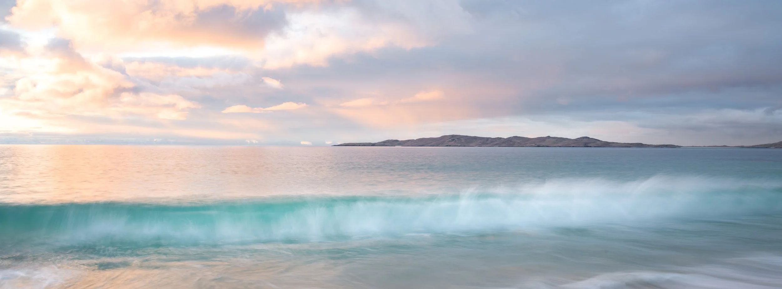 Landscape image, x-pan crop, Isle of Harris, Scotland. Seascape, water, waves